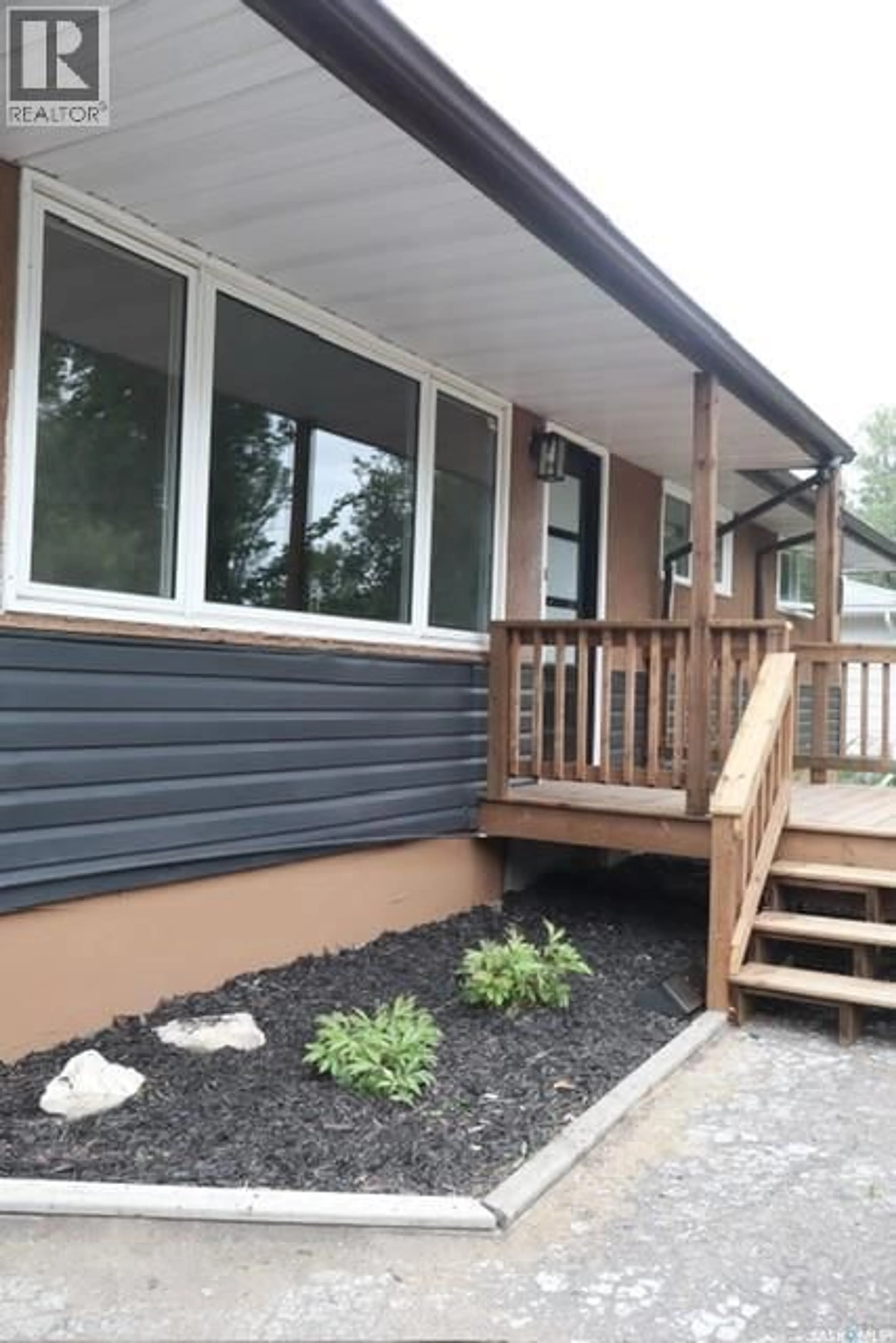 Home with vinyl exterior material, street for 310 GARNET STREET, Regina Saskatchewan S4R3J1