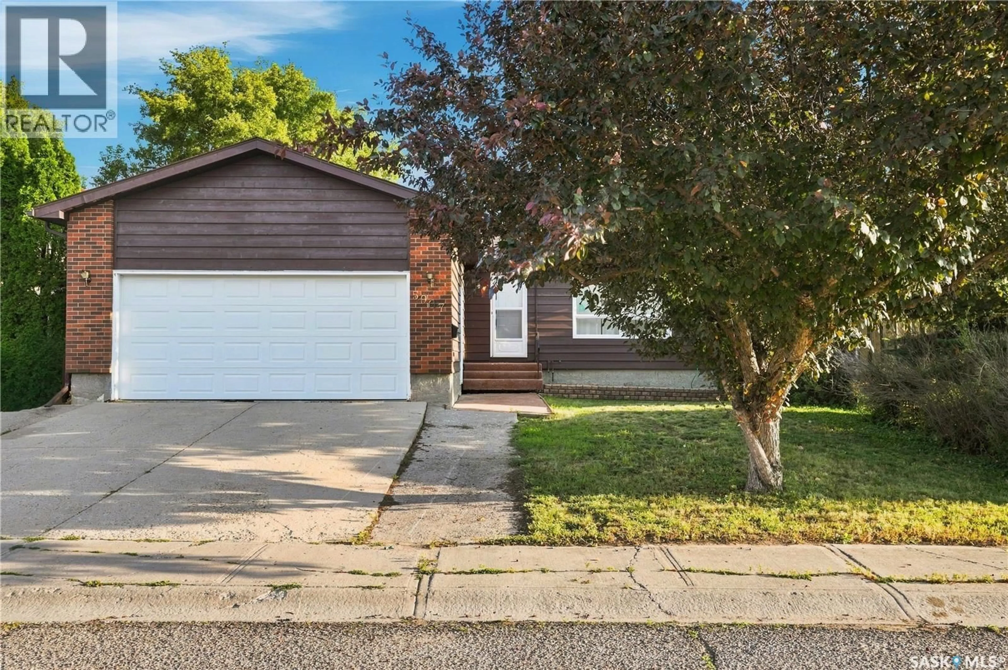 Home with vinyl exterior material, street for 5907 HAGUE CRESCENT, Regina Saskatchewan S4X3K6