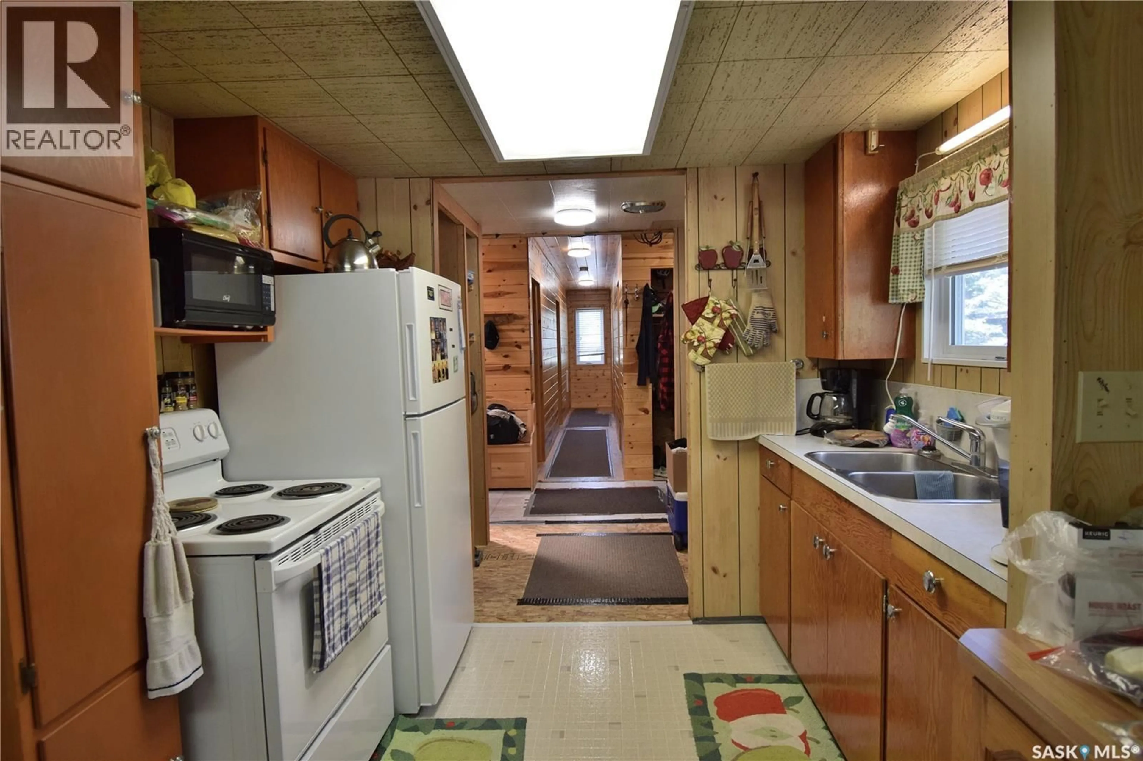 Standard kitchen, ceramic/tile floor for 87 150 OKEMA BEACH ROAD, Emma Lake Saskatchewan S0J0N0