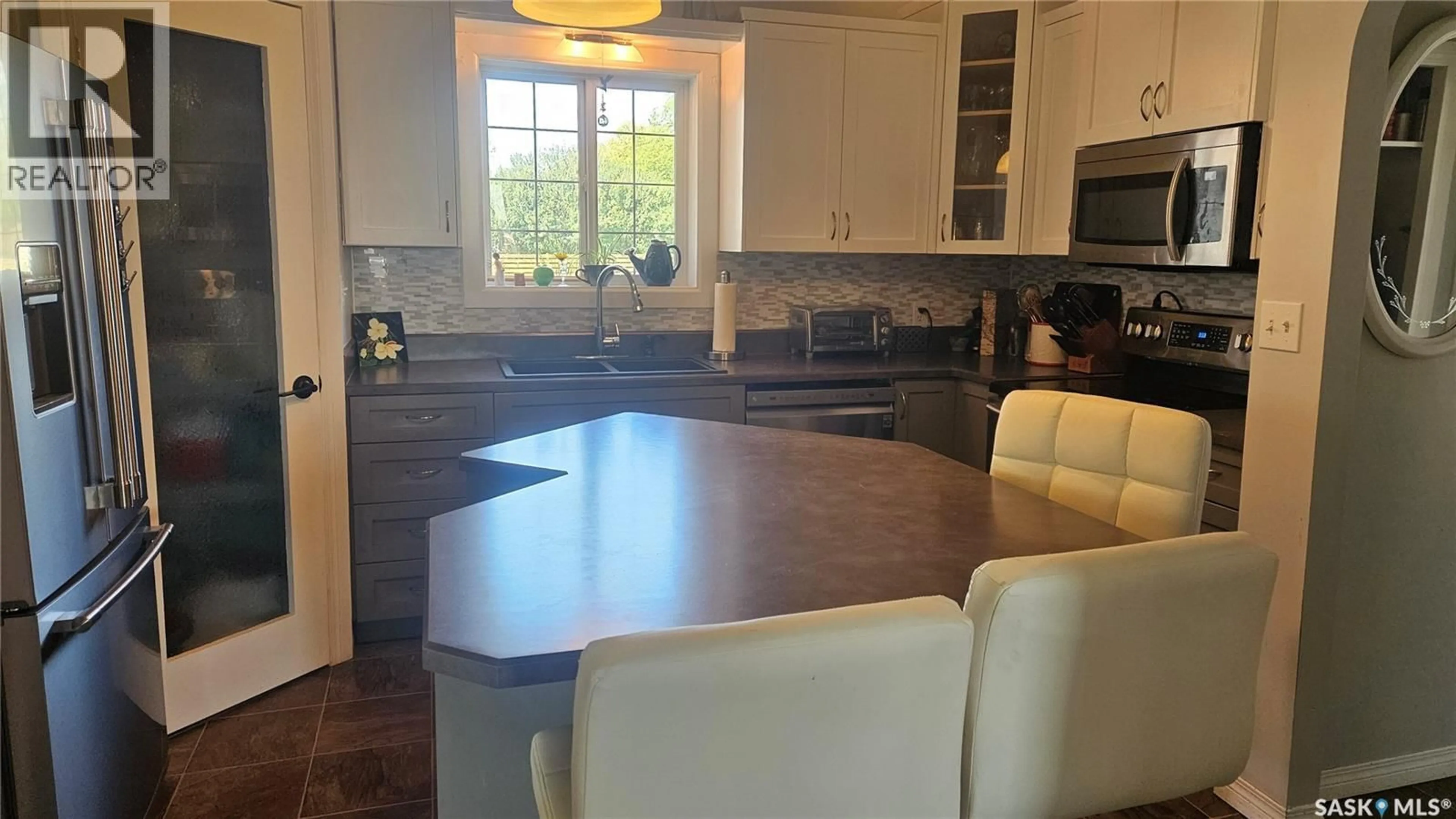 Open concept kitchen, ceramic/tile floor for 777 HIGHWAY, Cudworth Saskatchewan S0K1B0