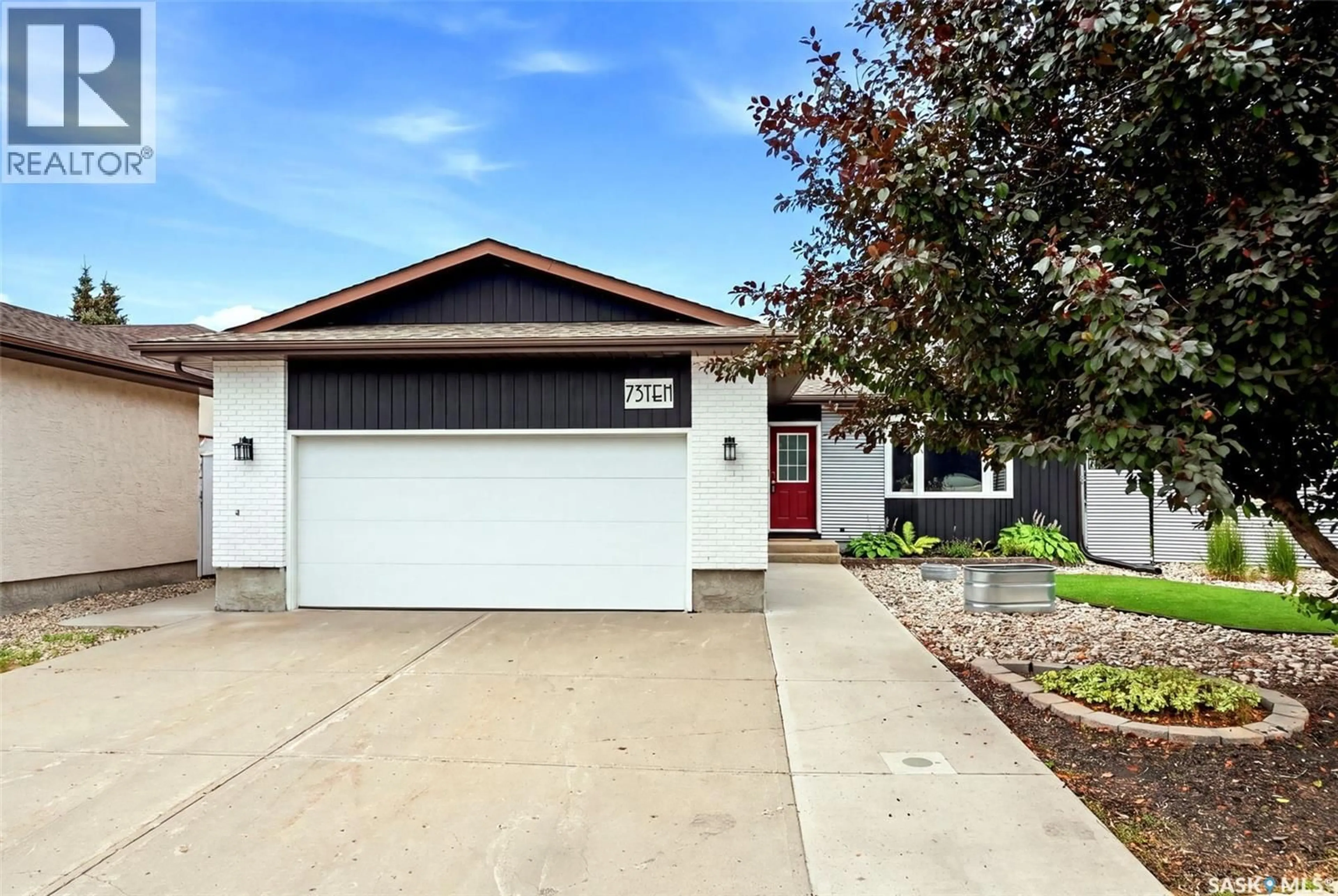Home with vinyl exterior material, street for 7310 CRIBBS BAY, Regina Saskatchewan S4X4H3