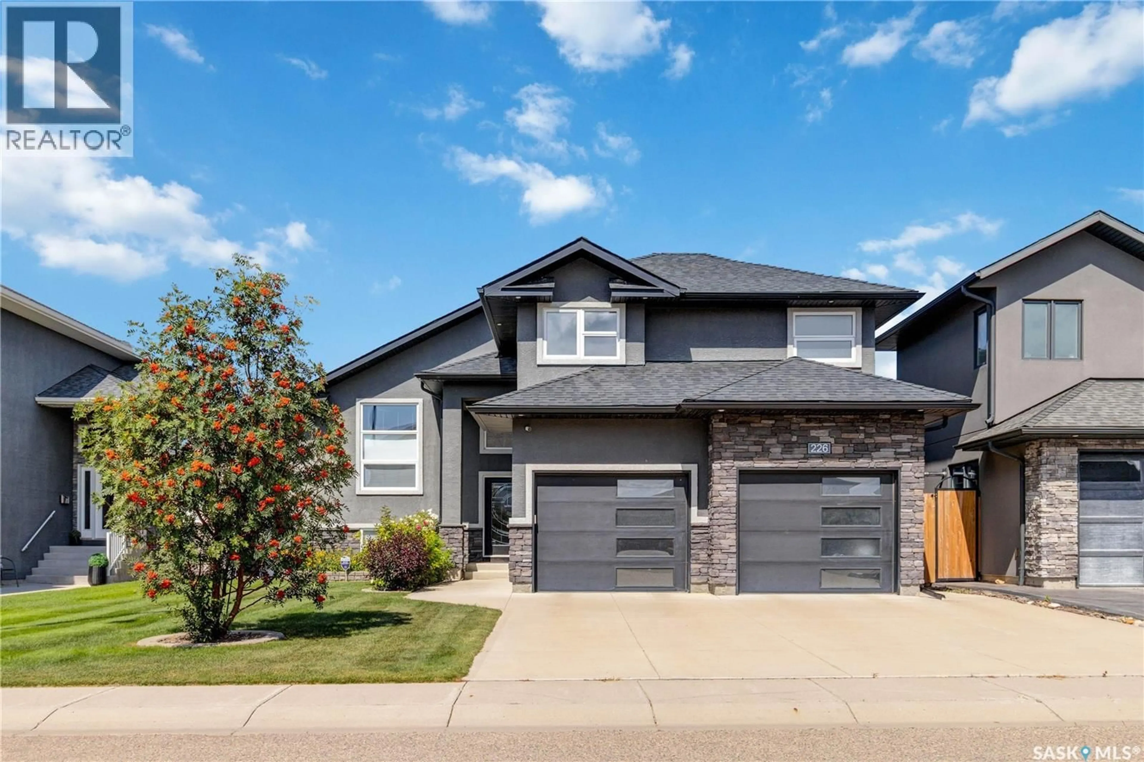 Home with brick exterior material, street for 226 MAHABIR COURT, Saskatoon Saskatchewan S7W0J5