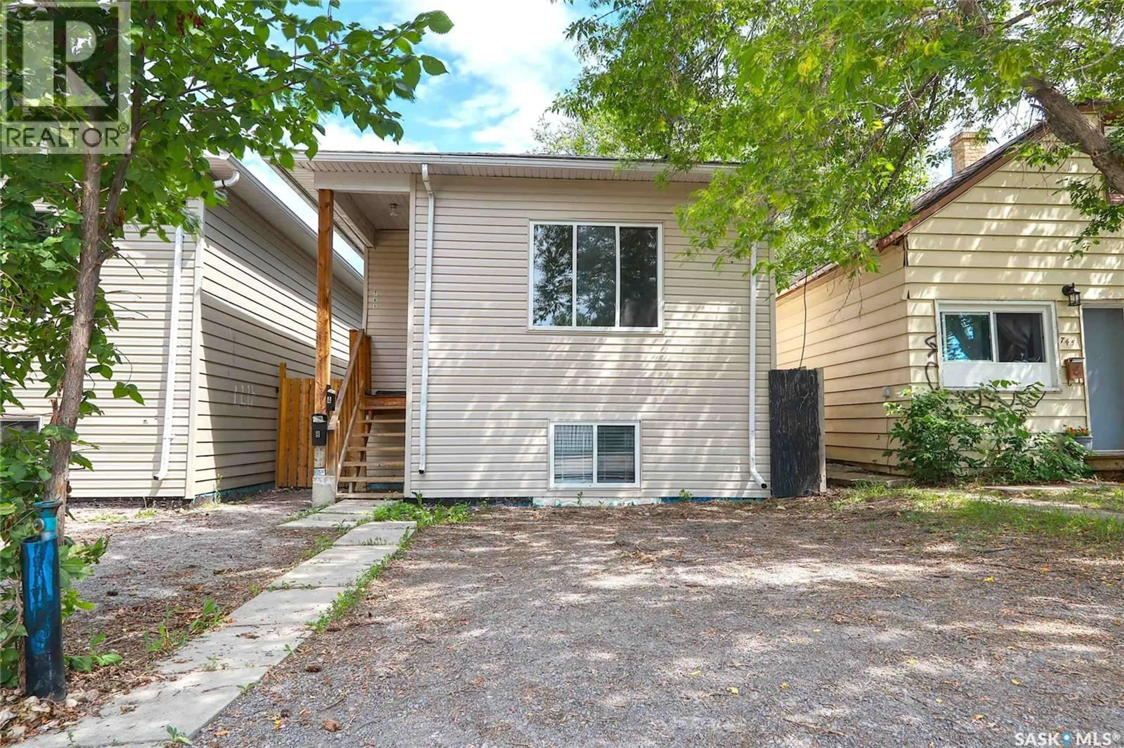 Home with vinyl exterior material, street for 741 GARNET STREET, Regina Saskatchewan S4T2X2