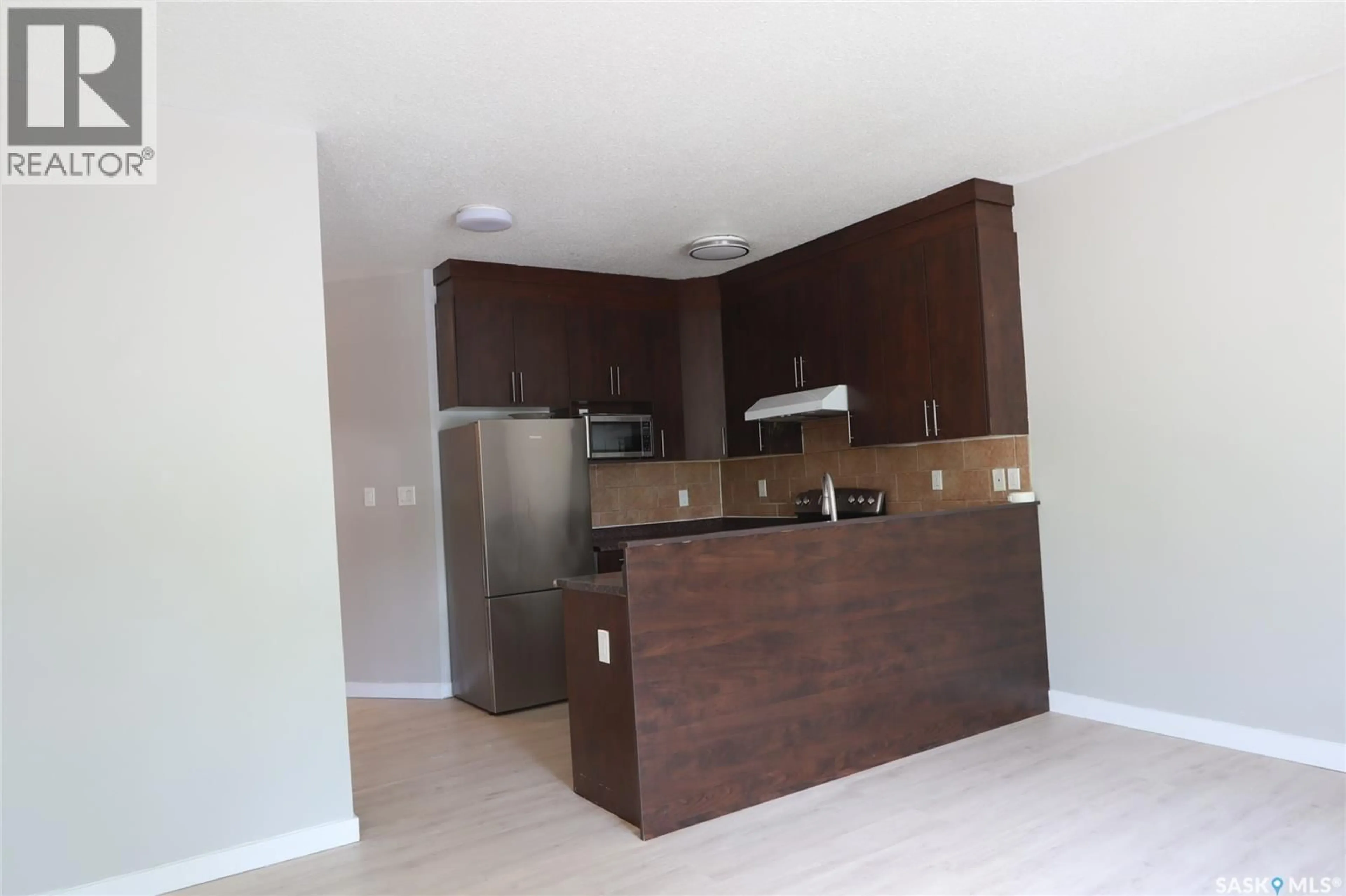 Standard kitchen, wood/laminate floor for 741 GARNET STREET, Regina Saskatchewan S4T2X2