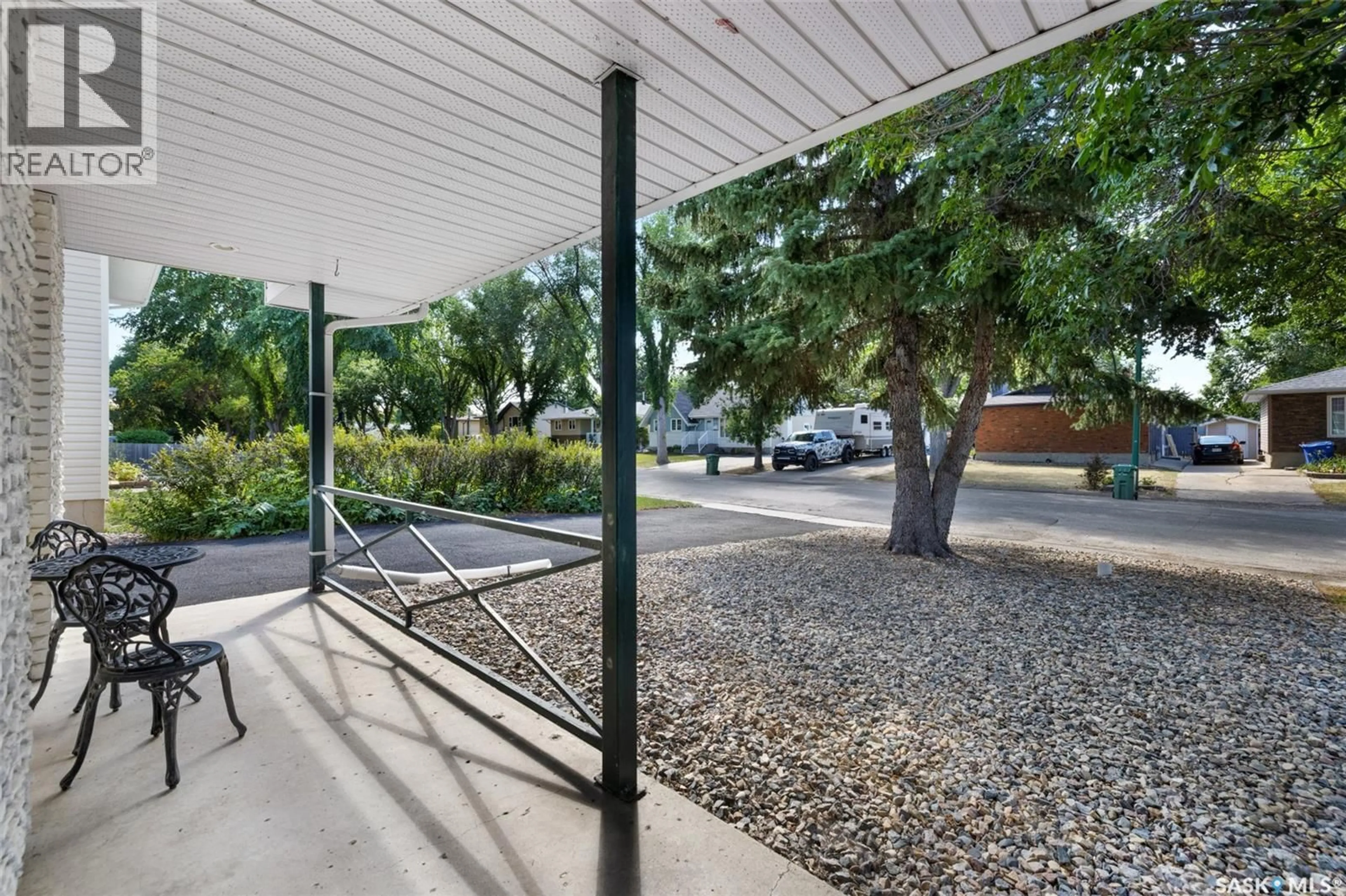 Patio, street for 305 HANLEY CRESCENT, Regina Saskatchewan S4R5A9