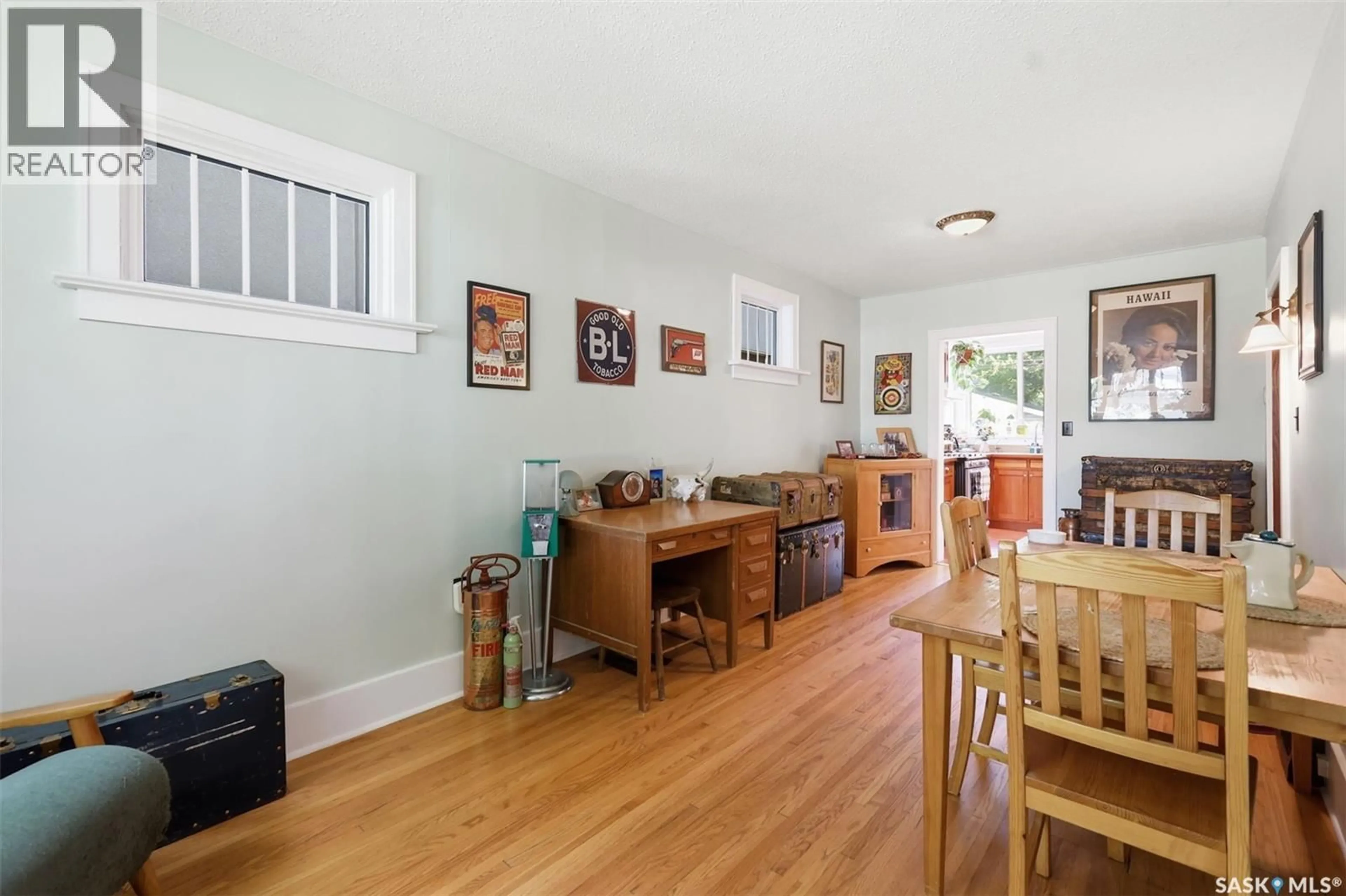 Dining room, wood/laminate floor for 919 6TH AVENUE, Saskatoon Saskatchewan S7K2T3