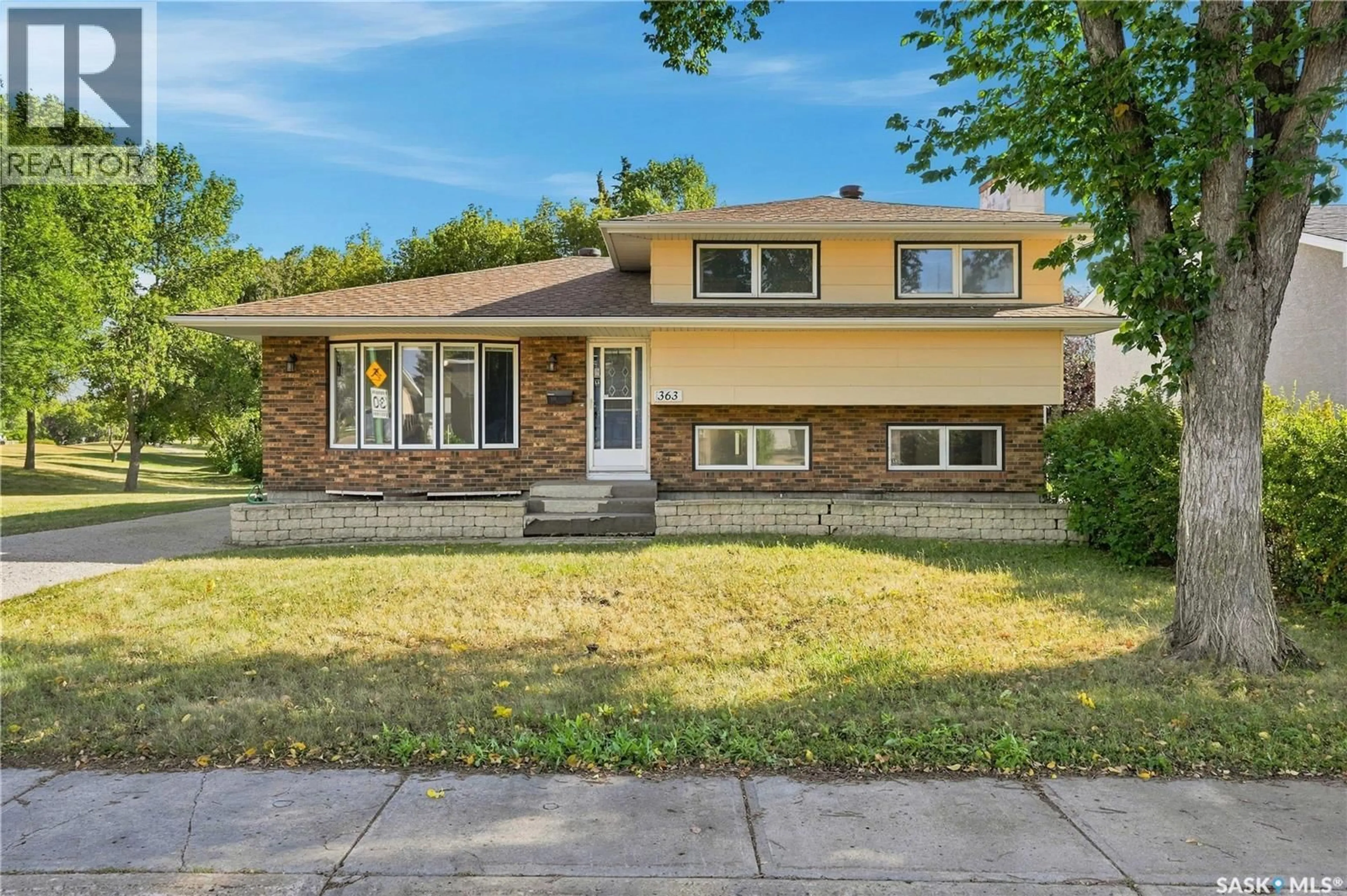 Home with brick exterior material, street for 363 RODENBUSH DRIVE, Regina Saskatchewan S4R6X5