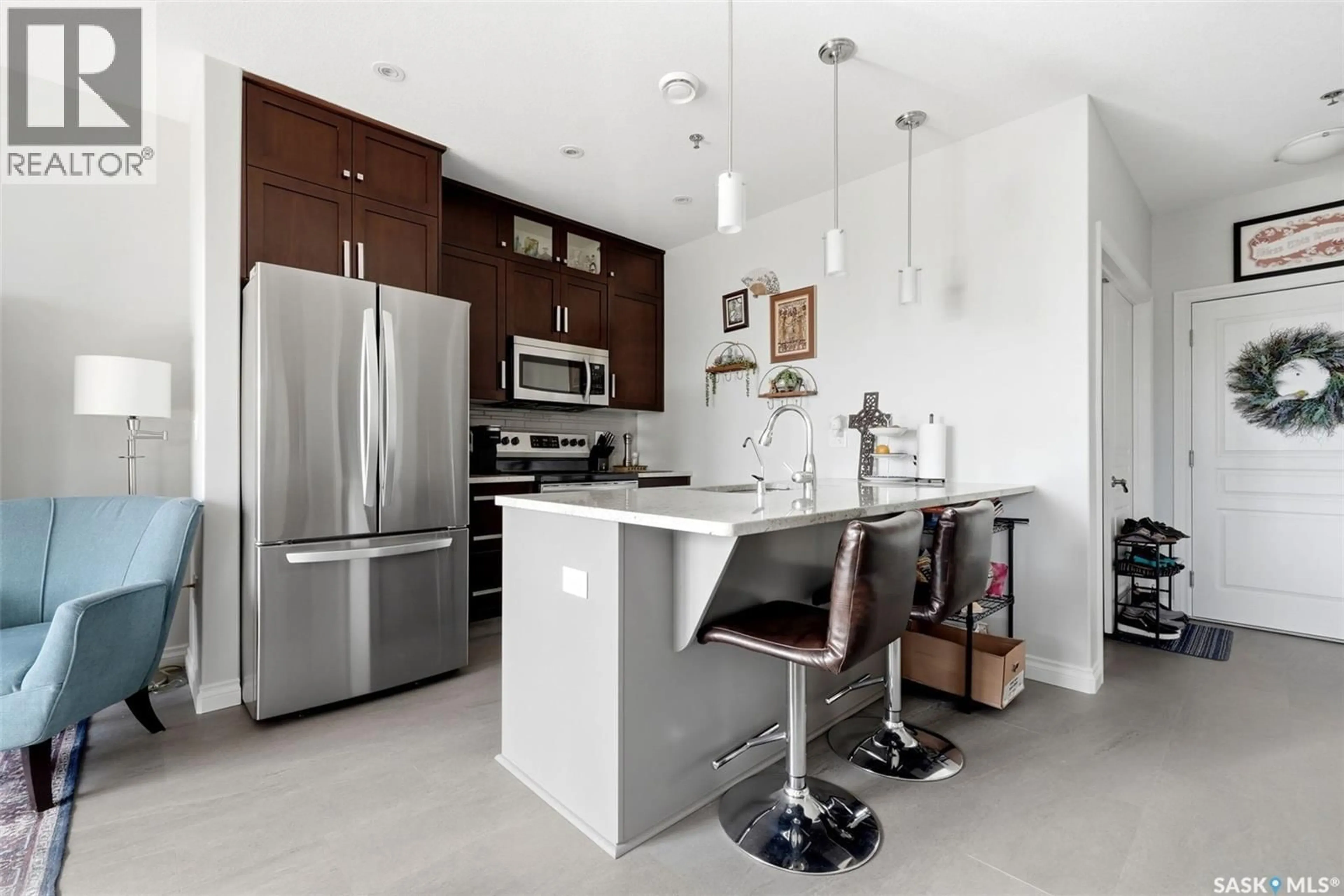 Contemporary kitchen, ceramic/tile floor for 206 - 1715 BADHAM BOULEVARD, Regina Saskatchewan S4P0L9