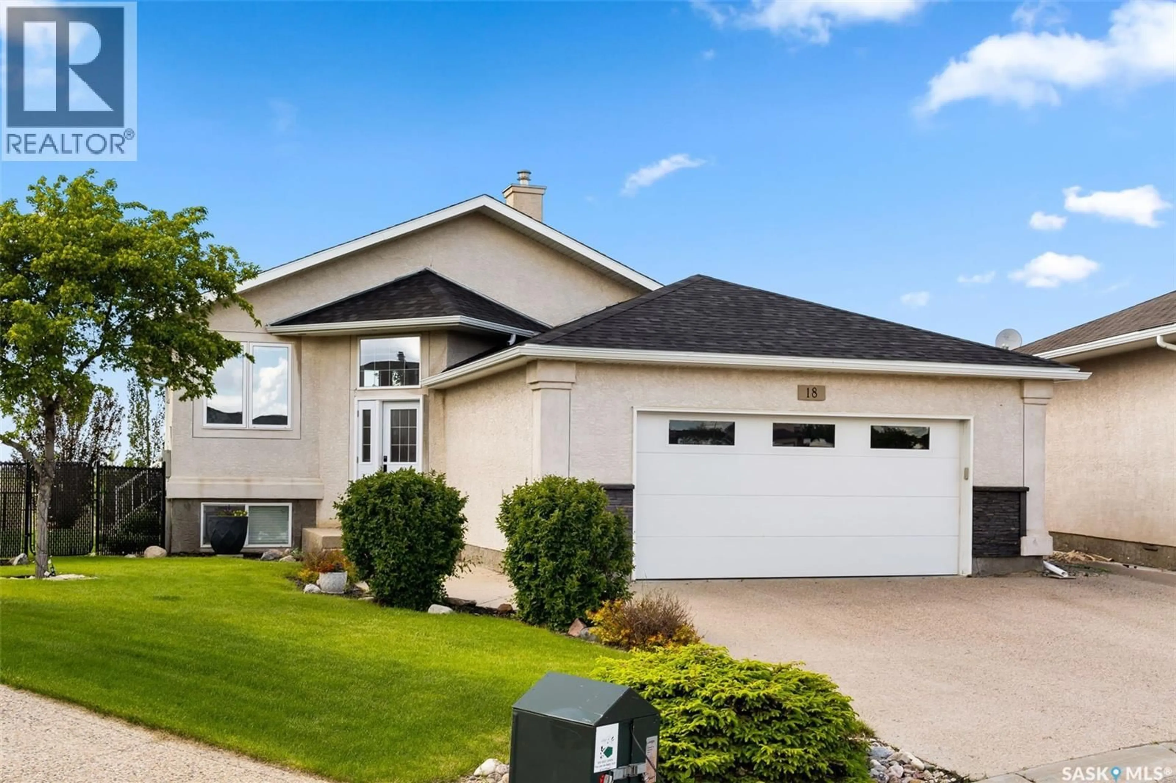 Home with vinyl exterior material, street for 18 MARWOOD BAY, Balgonie Saskatchewan S0G0E0