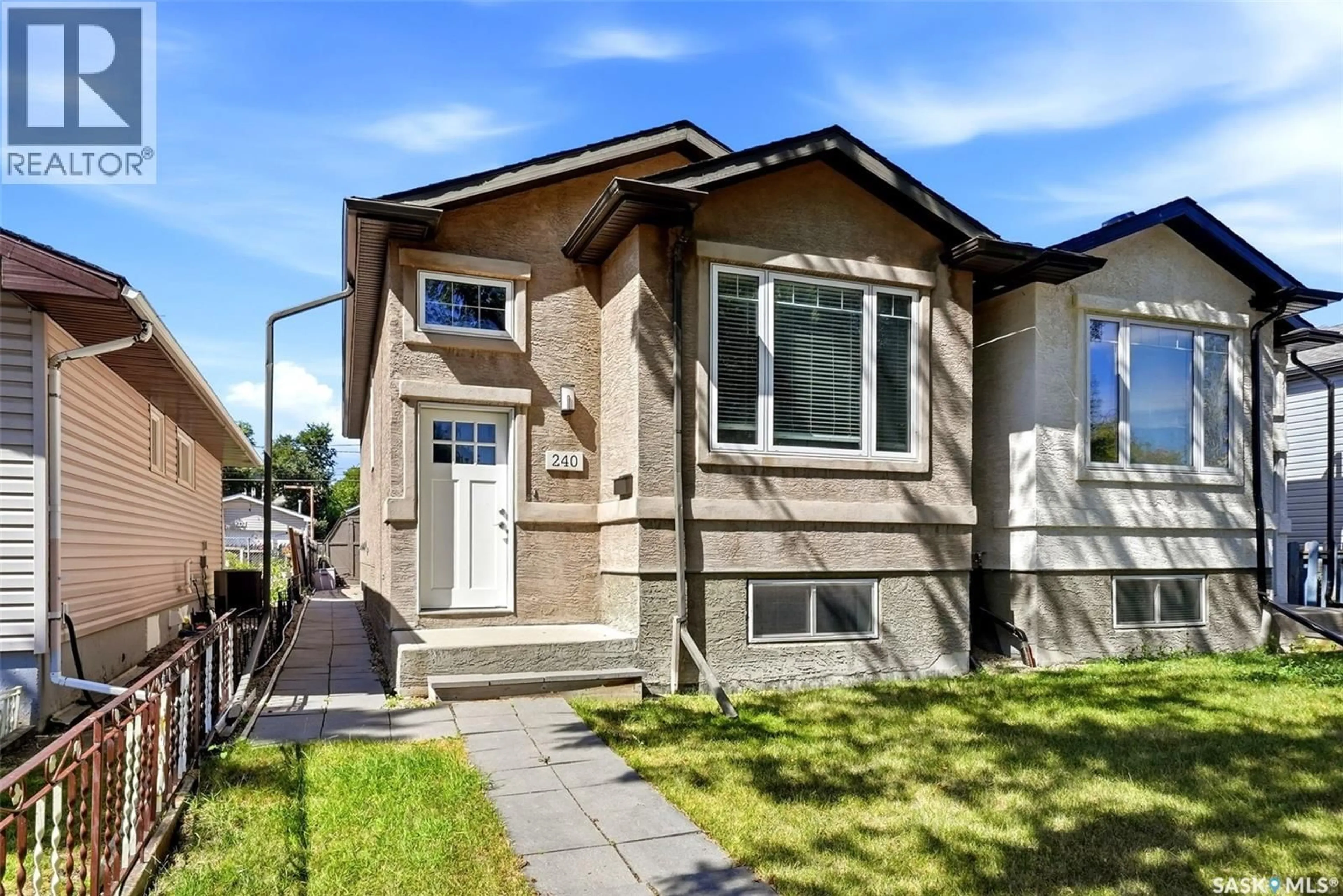 Home with vinyl exterior material, street for 240 OTTAWA STREET, Regina Saskatchewan S4R1N5