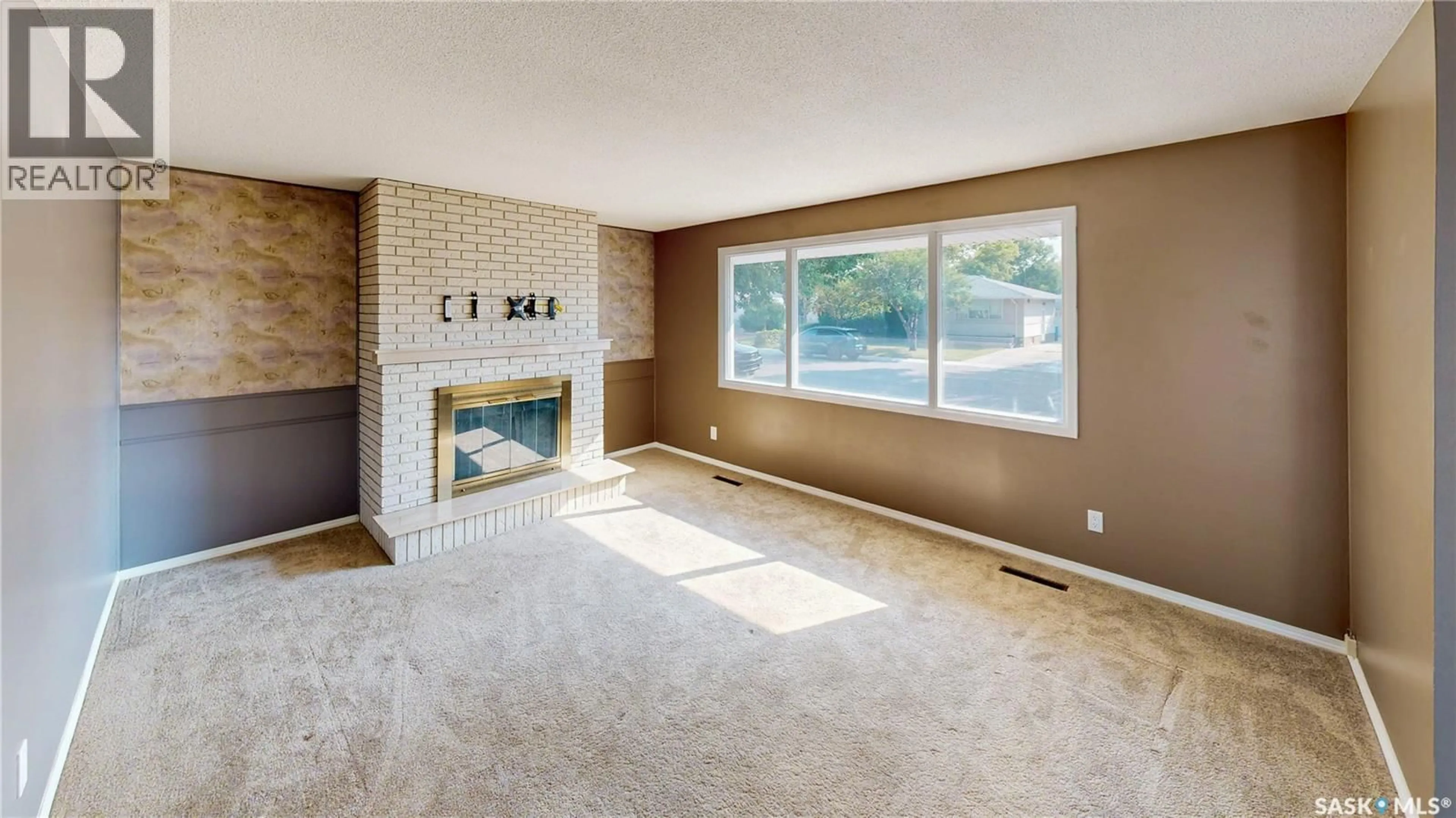 Living room with furniture, ceramic/tile floor for 60 GALE STREET, Regina Saskatchewan S4R4E1