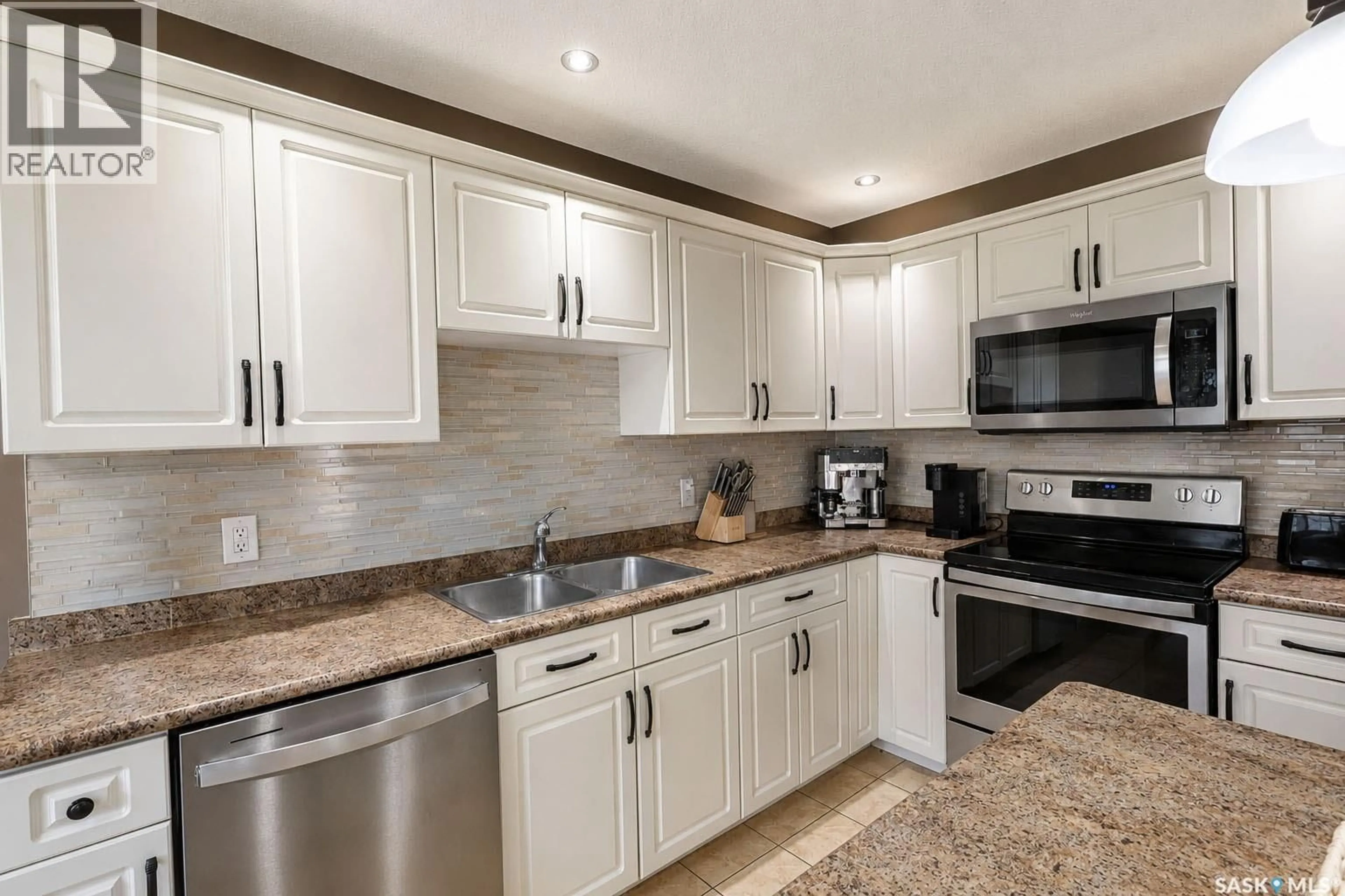 Open concept kitchen, ceramic/tile floor for 53 1600 MUZZY DRIVE, Prince Albert Saskatchewan S6X0A1