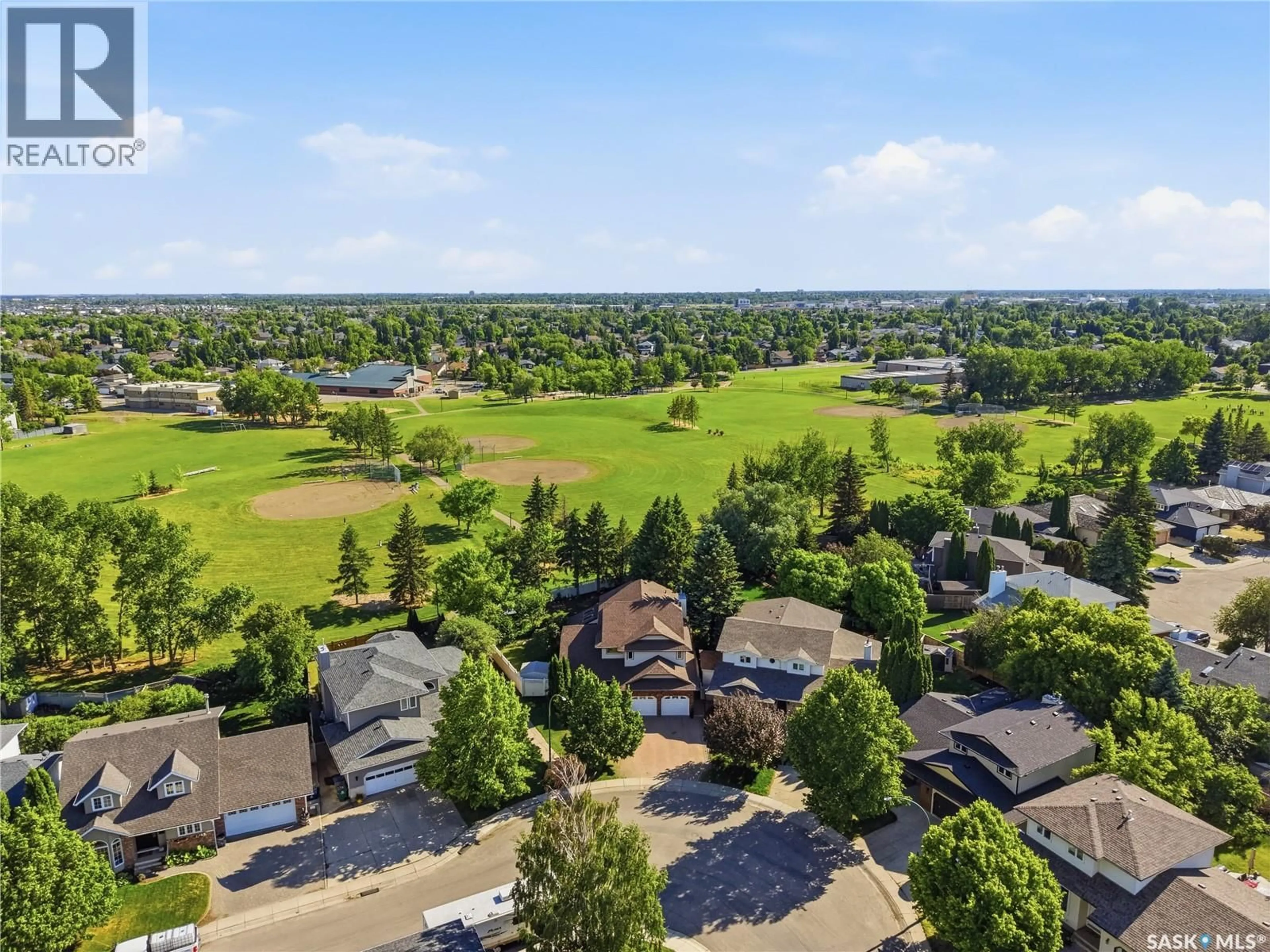 A pic from outside/outdoor area/front of a property/back of a property/a pic from drone, water/lake/river/ocean view for 130 MULCASTER CRESCENT, Saskatoon Saskatchewan S7N4A7