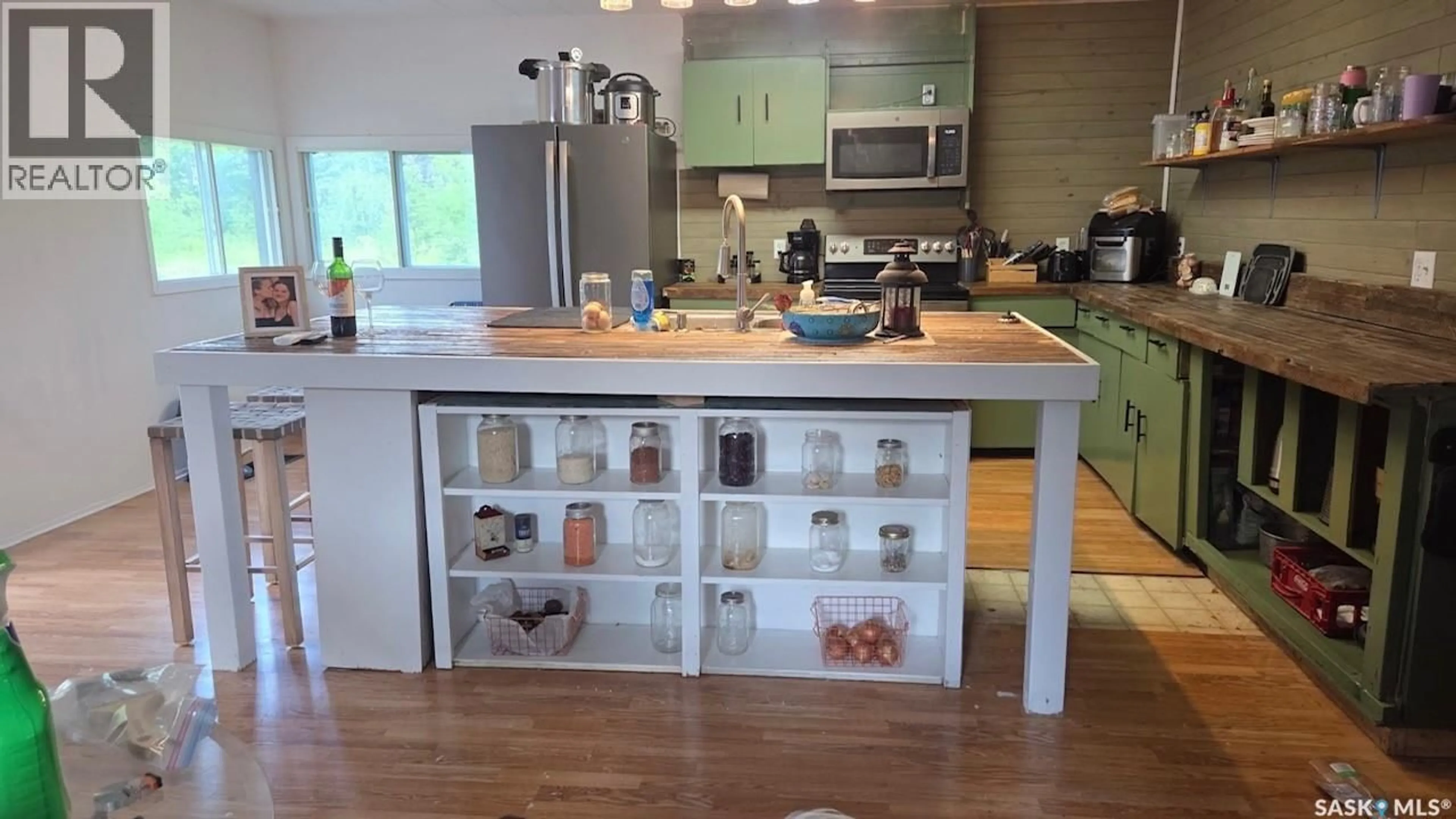 Open concept kitchen, wood/laminate floor for HALEY ACREAGE, Cote Rm No. 271 Saskatchewan S0A3P0