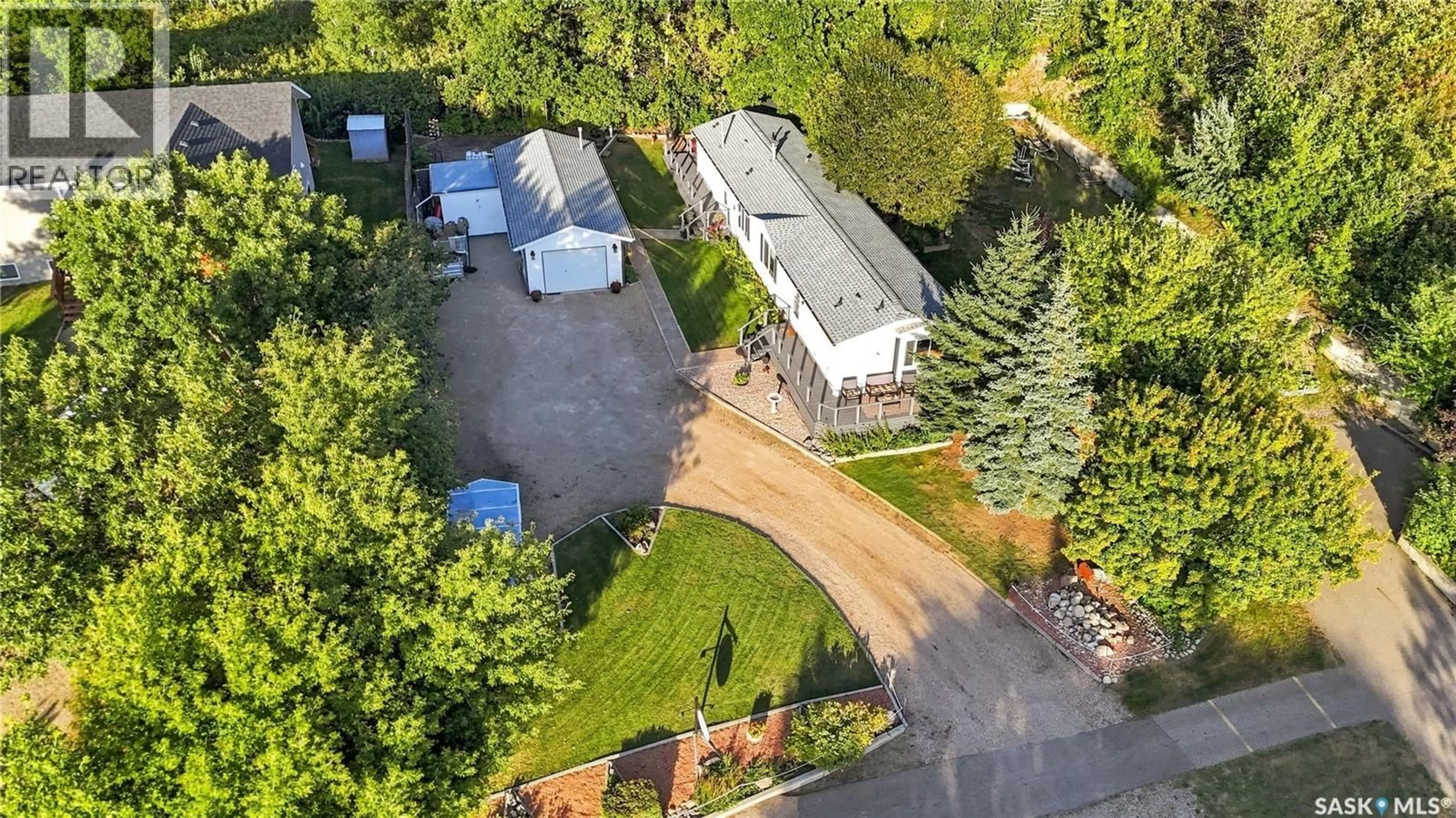 A pic from outside/outdoor area/front of a property/back of a property/a pic from drone, street for 101 KATEPWA DRIVE, Katepwa Beach Saskatchewan S0G2K0