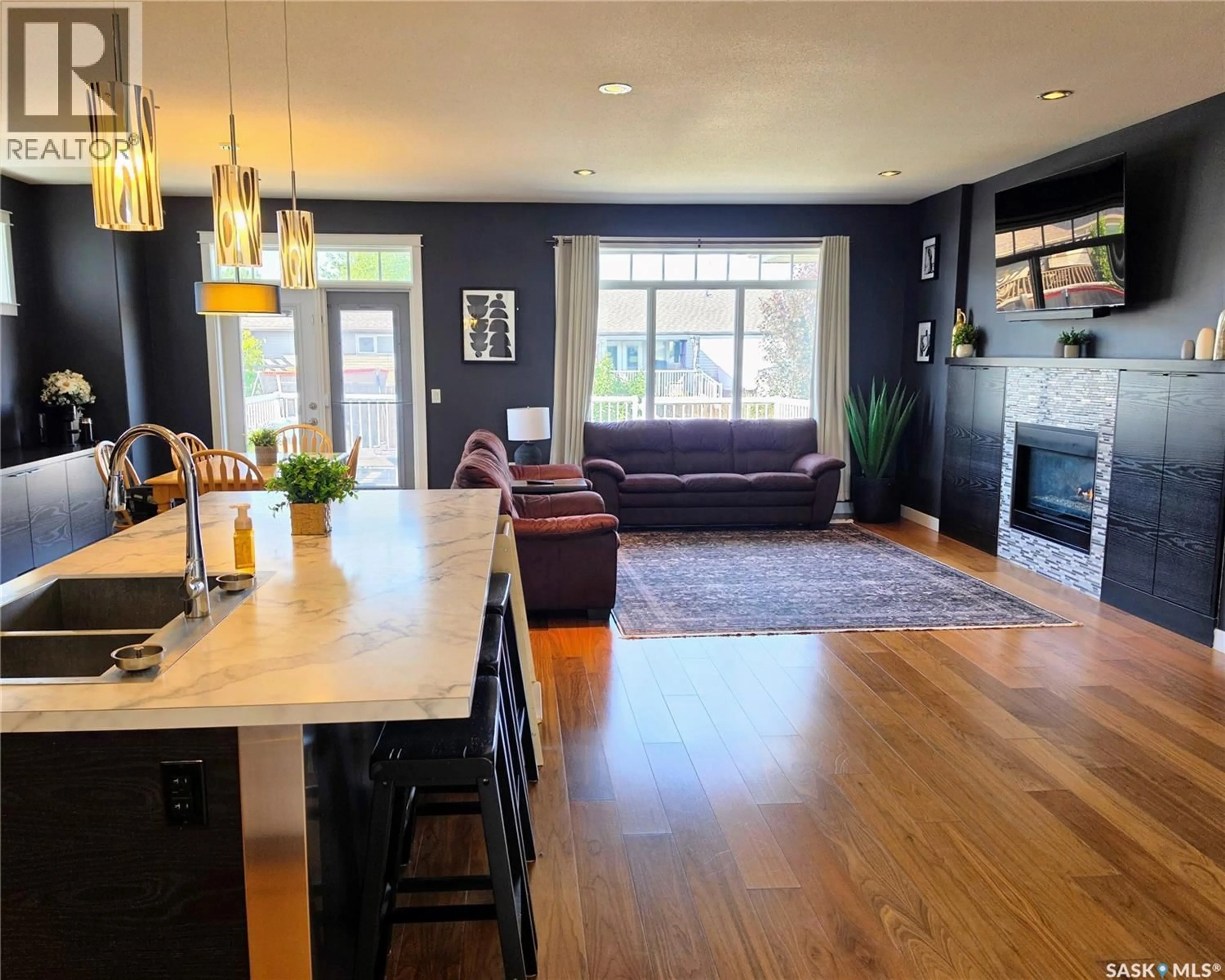 Open concept kitchen, wood/laminate floor for 191 SASKATCHEWAN AVENUE, Humboldt Saskatchewan S0K2A0