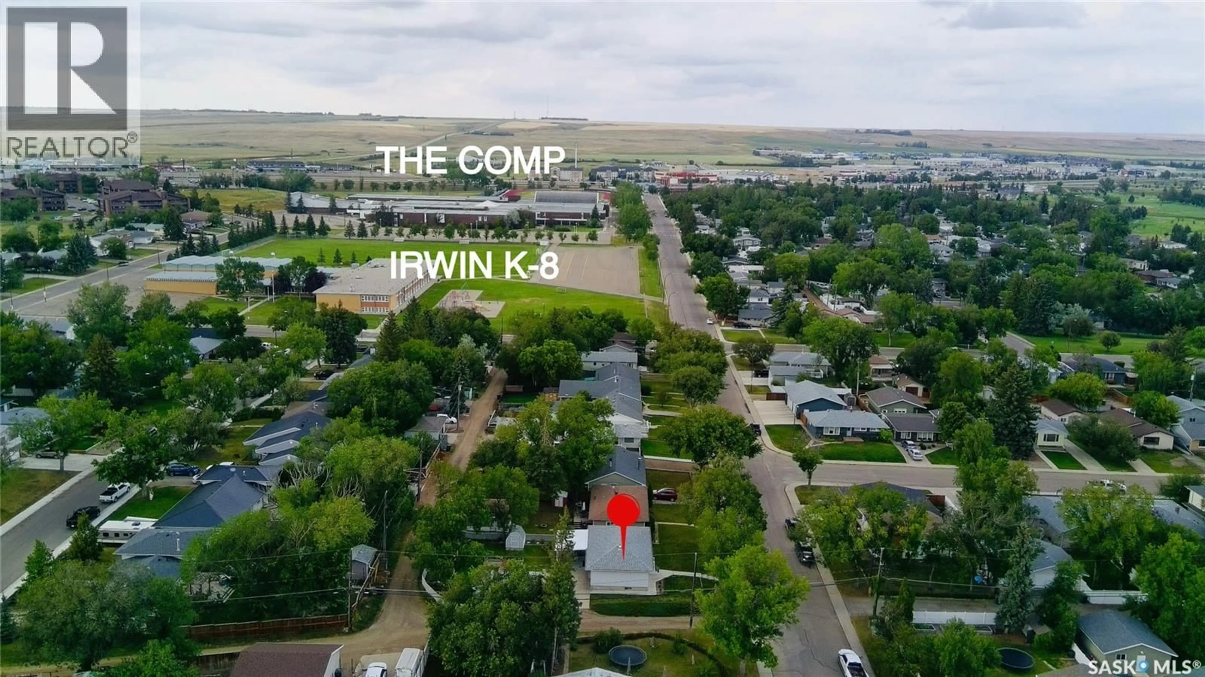 A pic from outside/outdoor area/front of a property/back of a property/a pic from drone, water/lake/river/ocean view for 810 11TH AVENUE, Swift Current Saskatchewan S9H2V4