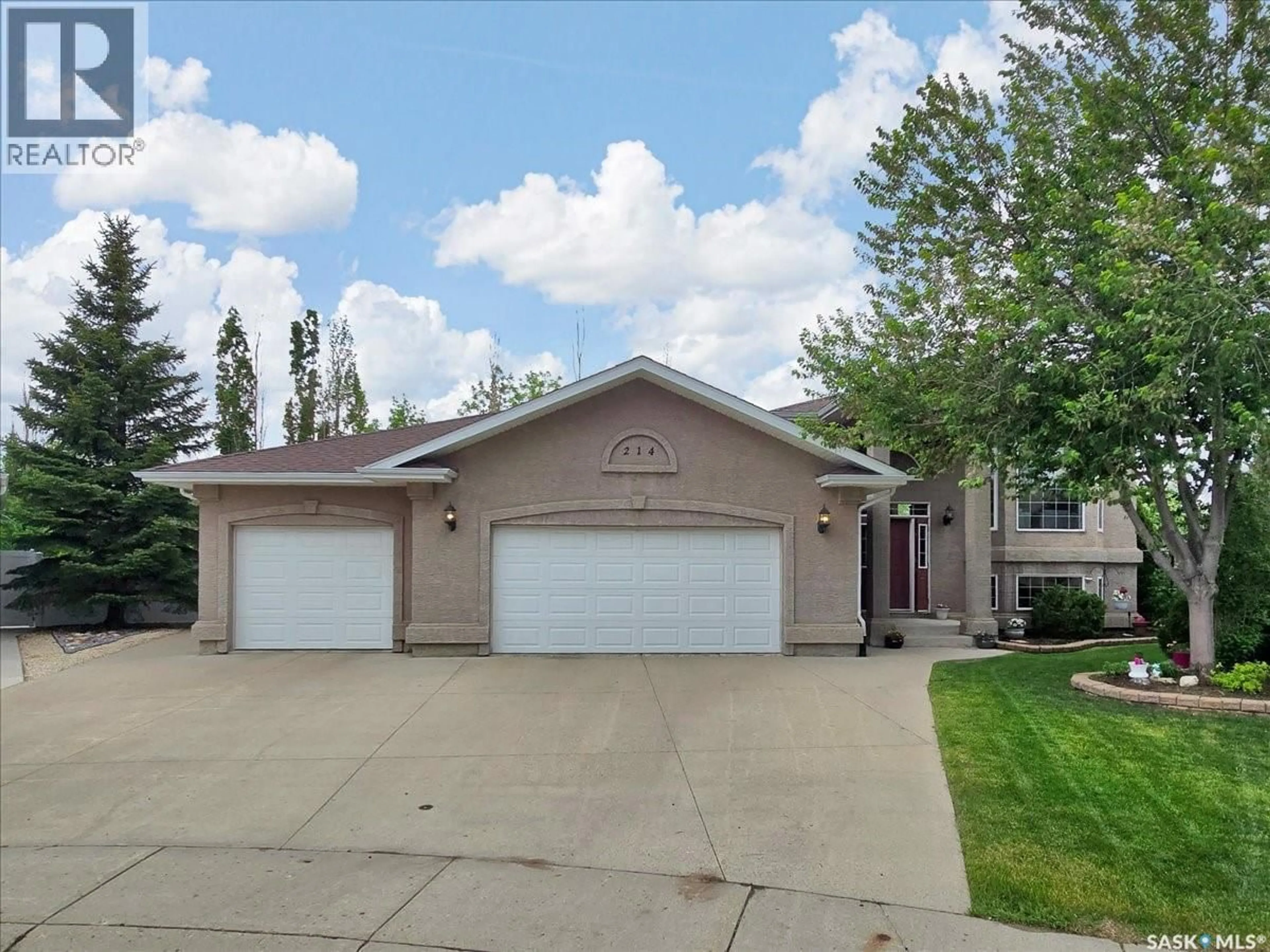 Home with vinyl exterior material, street for 214 BURKE PLACE, Warman Saskatchewan S0K4S0