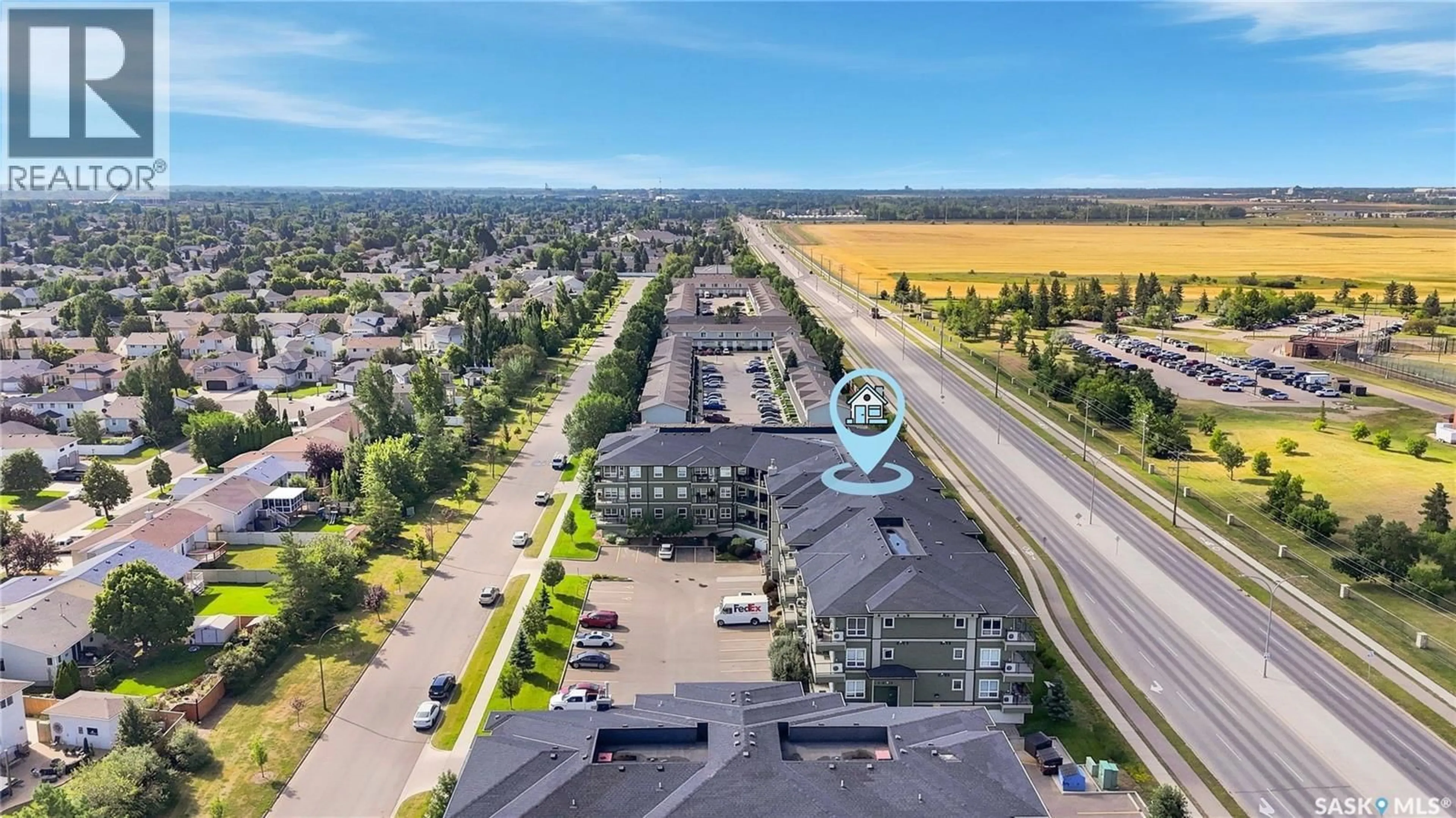 A pic from outside/outdoor area/front of a property/back of a property/a pic from drone, street for 915 - 229 KRISTJANSON ROAD, Saskatoon Saskatchewan S7S0B1