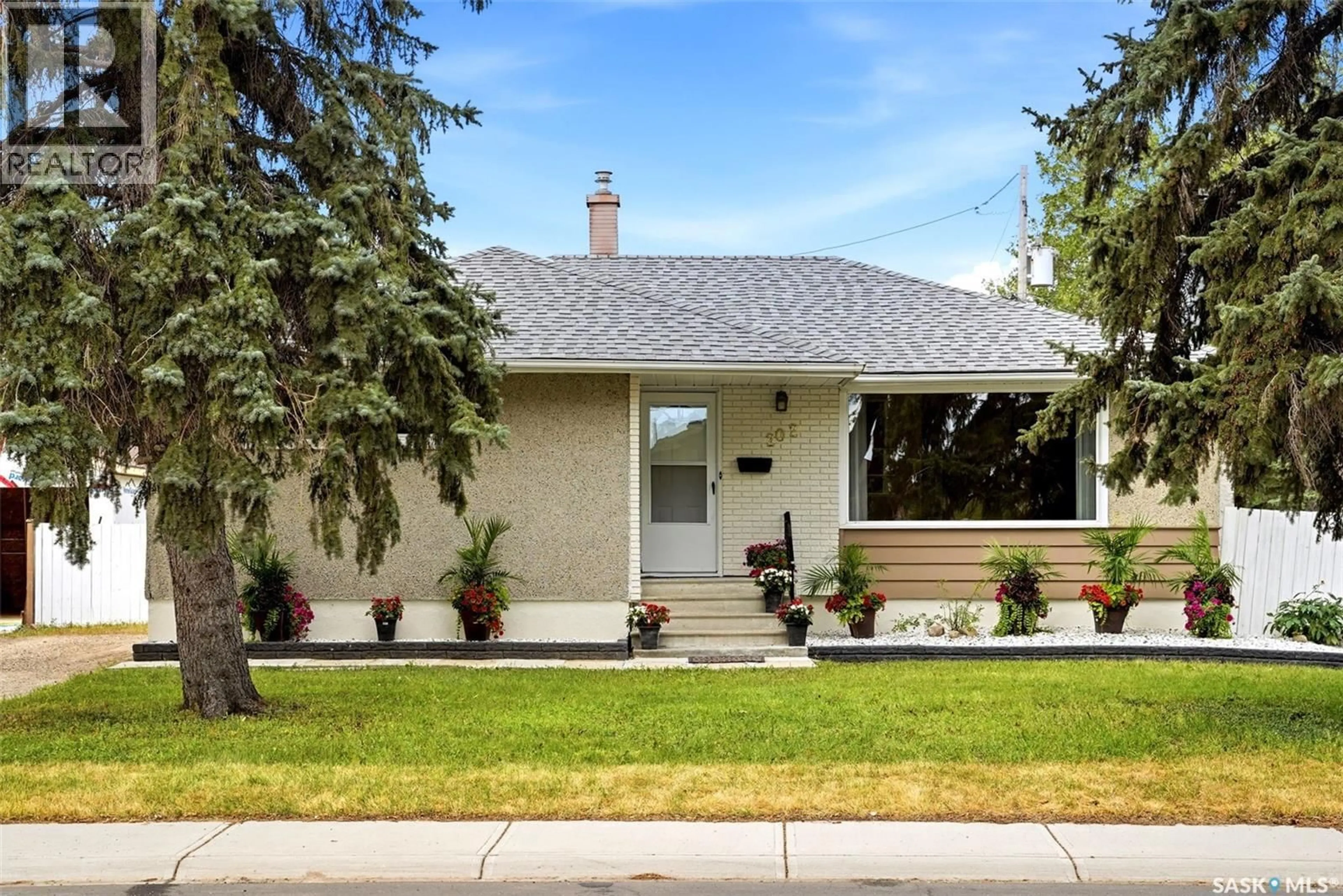 Home with brick exterior material, street for 202 MCCANNEL STREET, Regina Saskatchewan S4R3V1