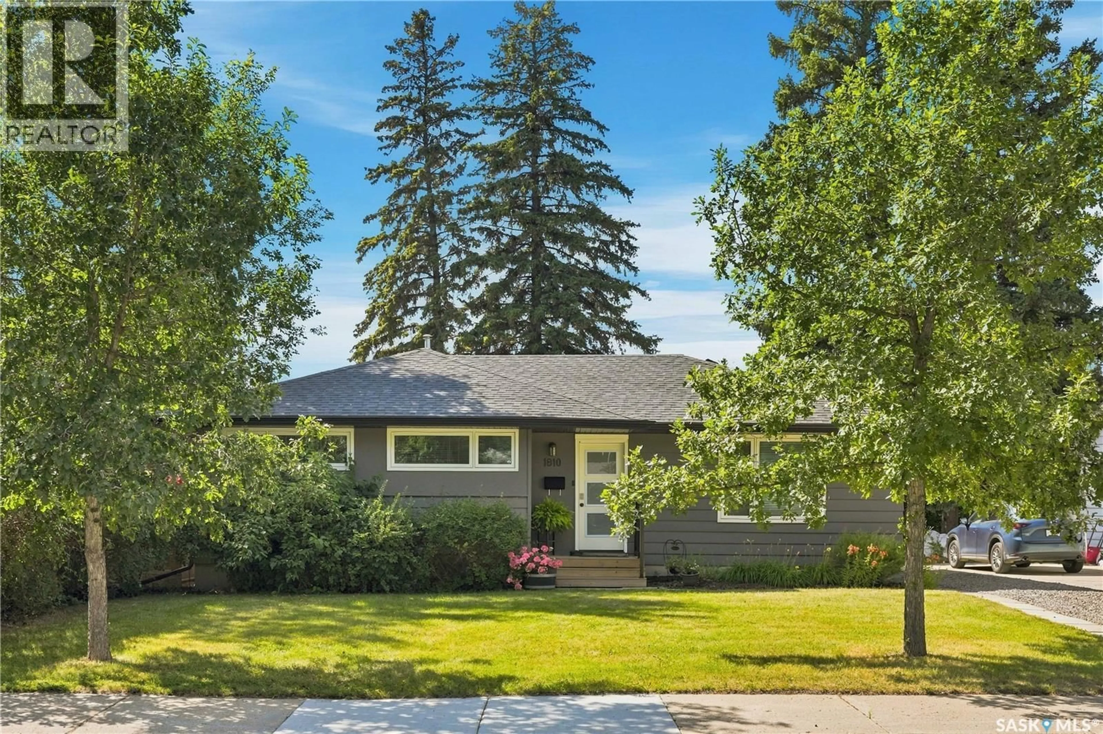 Home with vinyl exterior material, street for 1810 MORGAN AVENUE, Saskatoon Saskatchewan S7H2S3