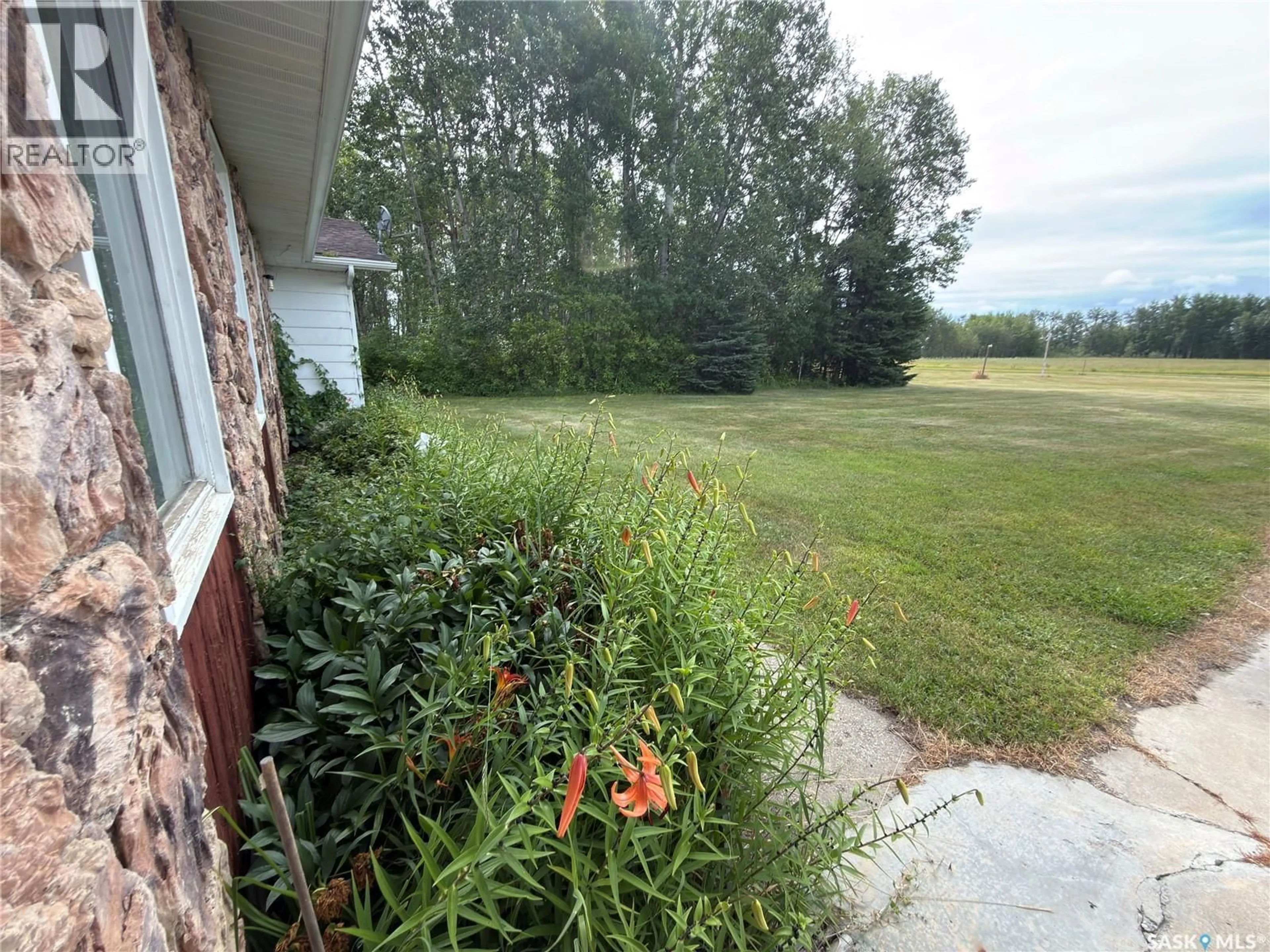 A pic from outside/outdoor area/front of a property/back of a property/a pic from drone, unknown for 10.26 SOUTH ACREAGE, Hudson Bay Rm No. 394 Saskatchewan S0E0Y0