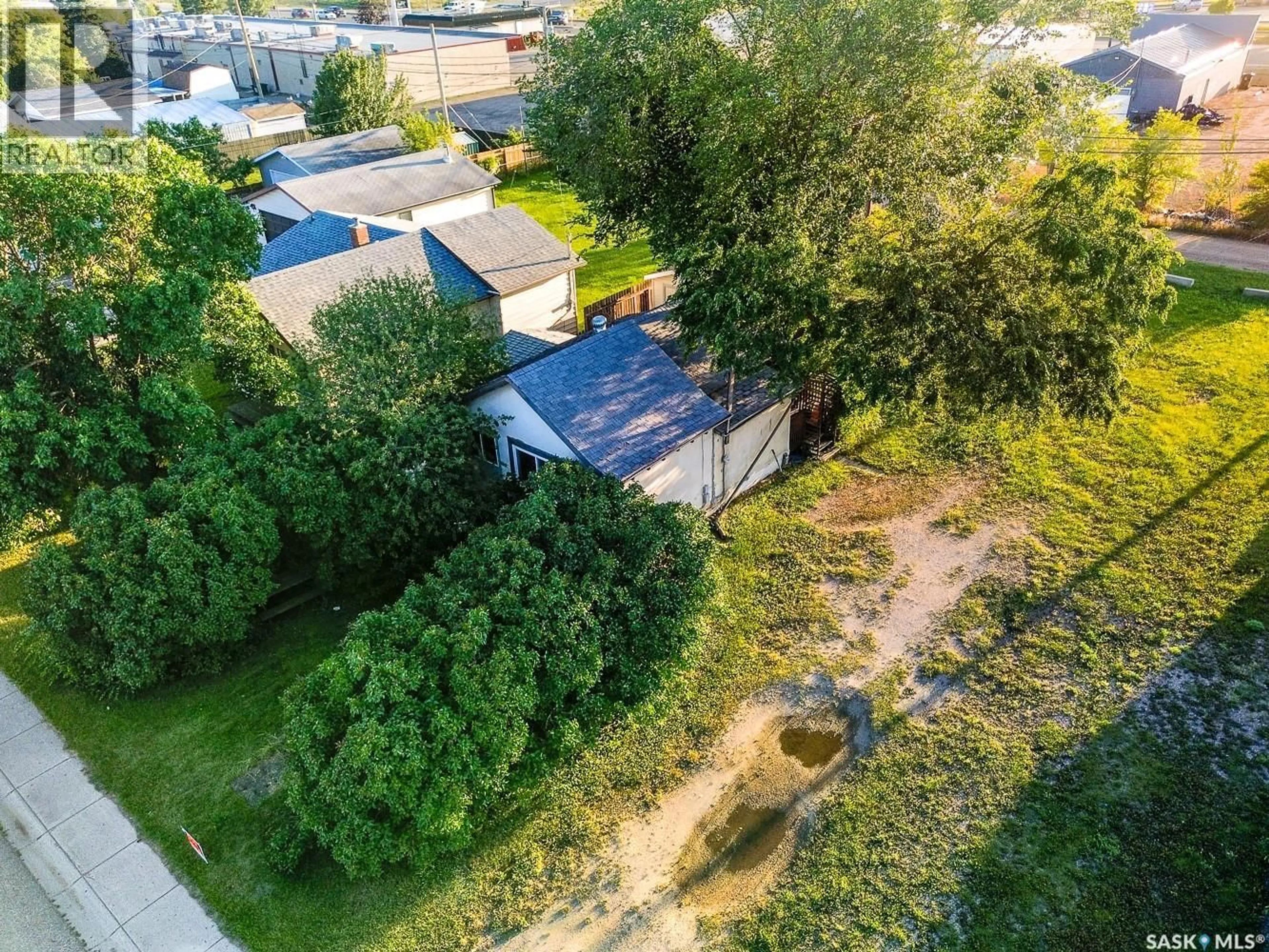 A pic from outside/outdoor area/front of a property/back of a property/a pic from drone, street for 30 1ST AVENUE, Martensville Saskatchewan S0K0A2