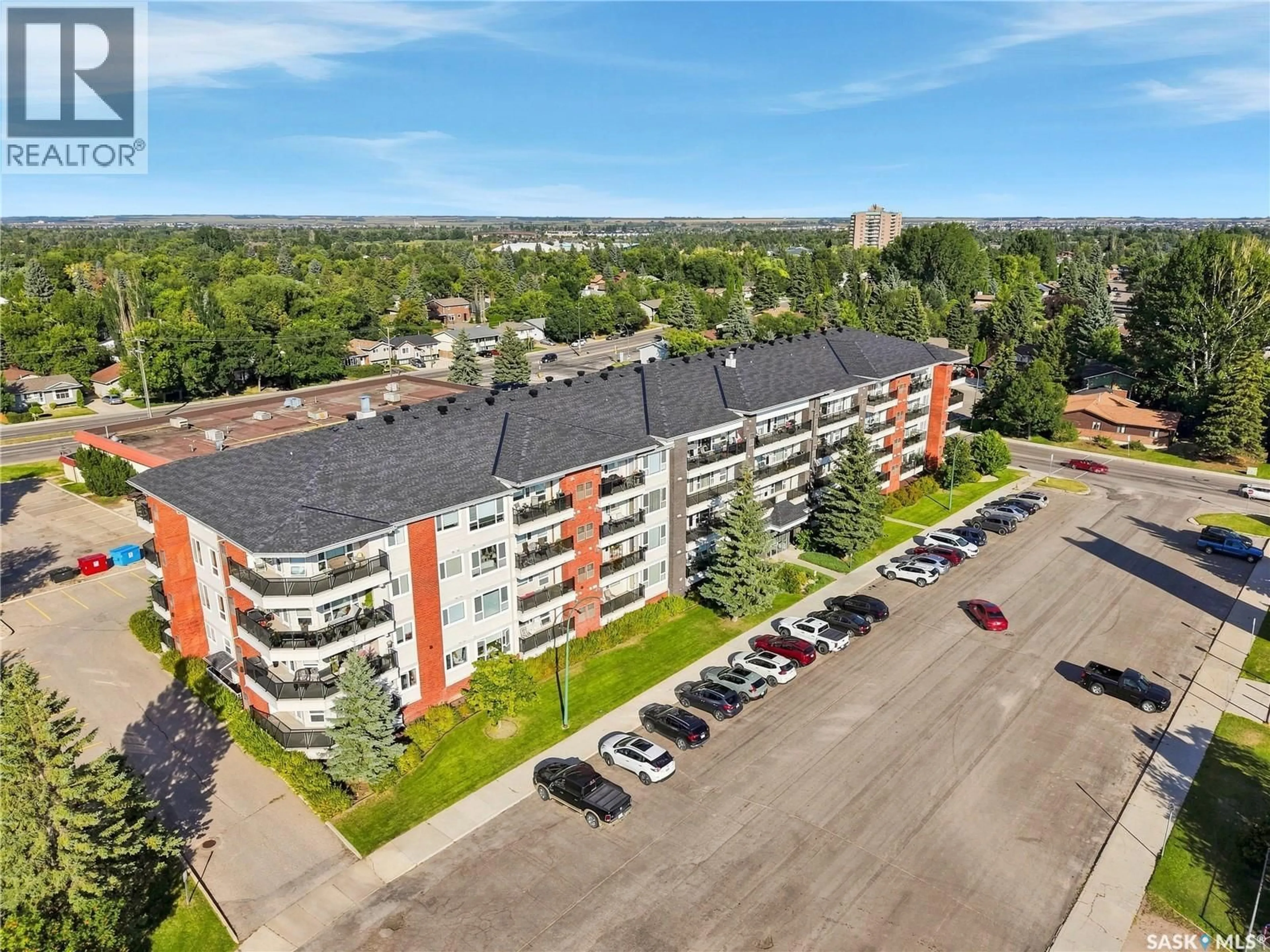 A pic from outside/outdoor area/front of a property/back of a property/a pic from drone, city buildings view from balcony for 102 - 308 KINGSMERE PLACE, Saskatoon Saskatchewan S7J2K3