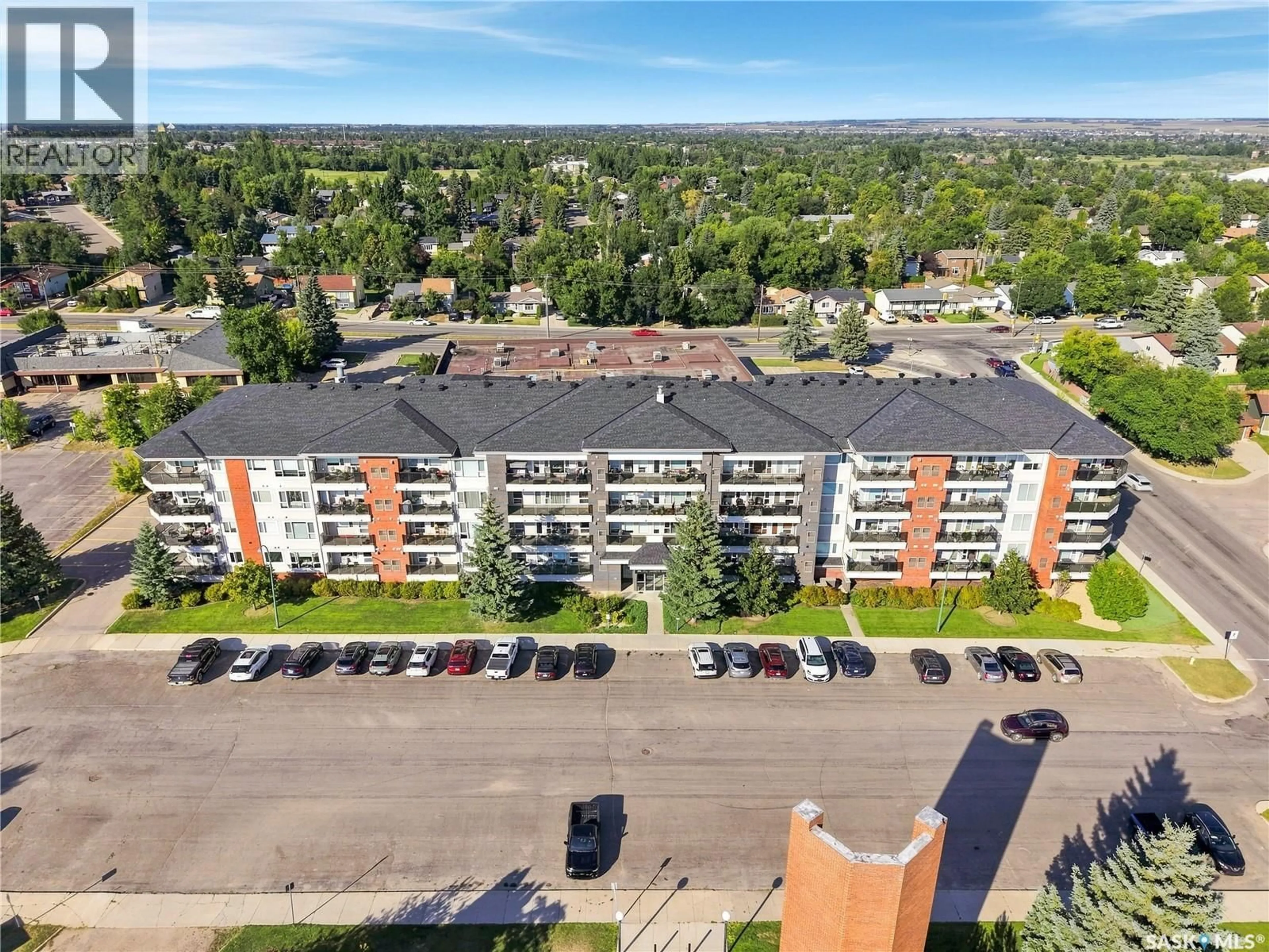 A pic from outside/outdoor area/front of a property/back of a property/a pic from drone, city buildings view from balcony for 102 - 308 KINGSMERE PLACE, Saskatoon Saskatchewan S7J2K3