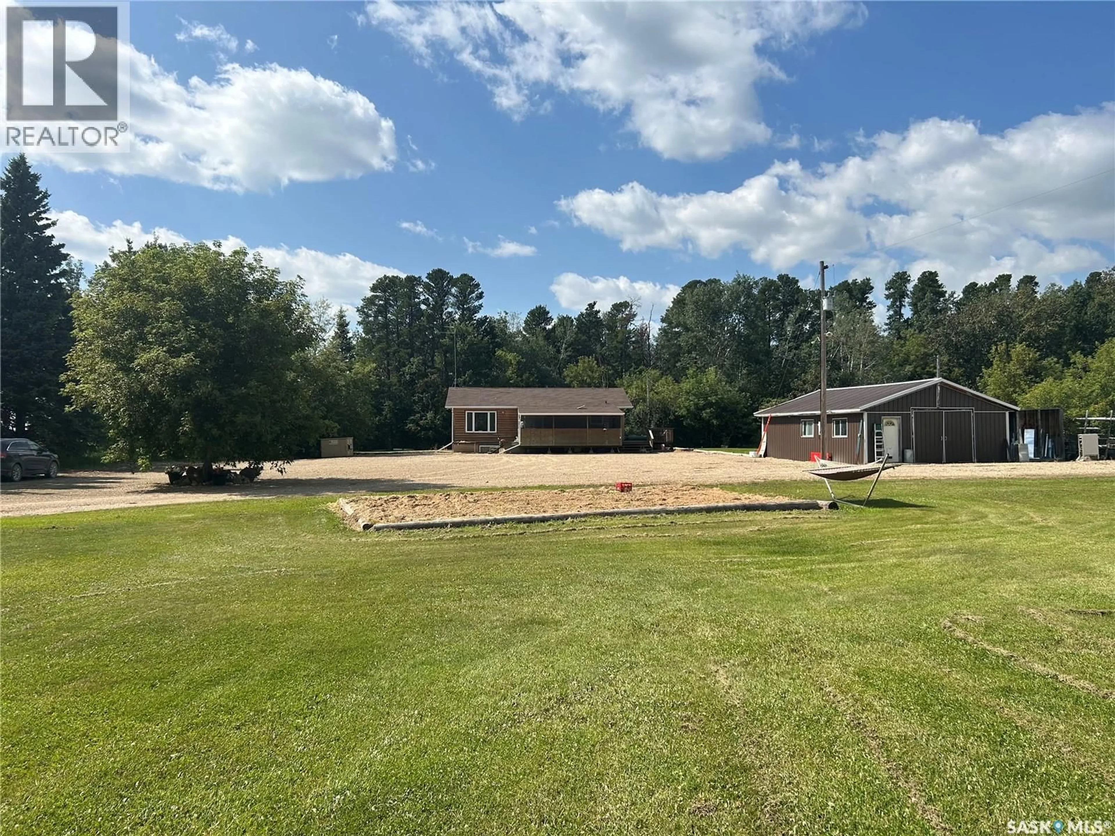 A pic from outside/outdoor area/front of a property/back of a property/a pic from drone, water/lake/river/ocean view for DZURKA ACREAGE, Tisdale Rm No. 427 Saskatchewan S0E0E0