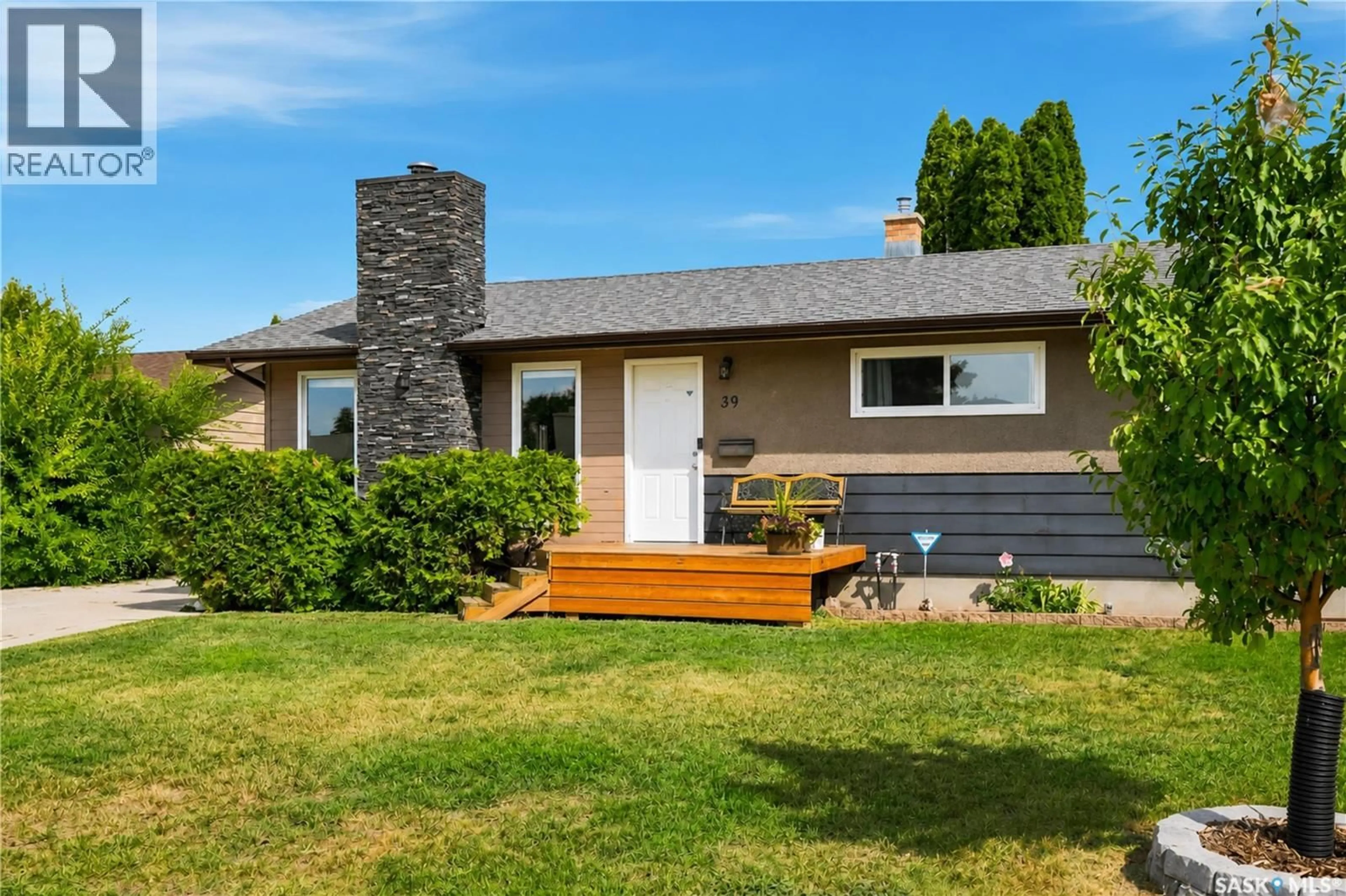 Home with vinyl exterior material, street for 39 BROWN CRESCENT, Saskatoon Saskatchewan S7J2R9