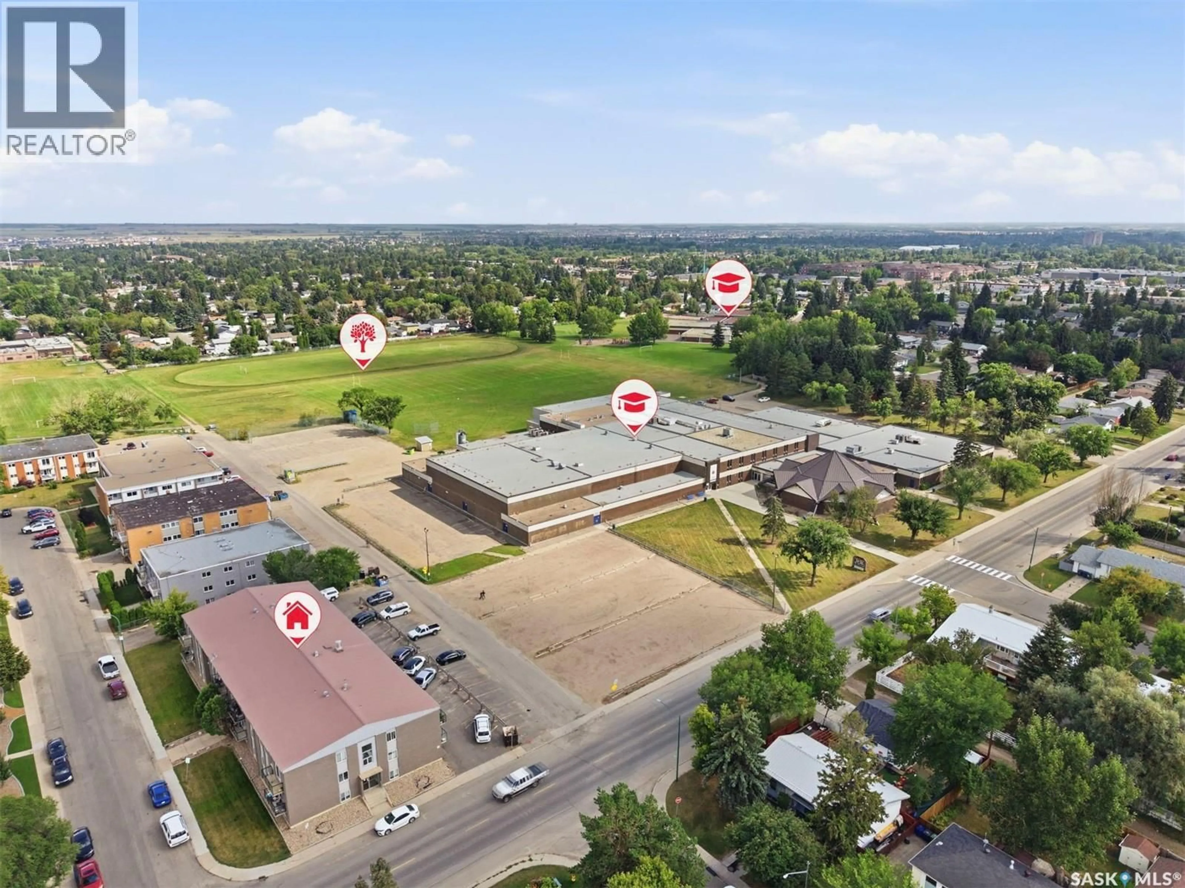 A pic from outside/outdoor area/front of a property/back of a property/a pic from drone, street for 2 - 26 SUMMERS PLACE, Saskatoon Saskatchewan S7H3W4