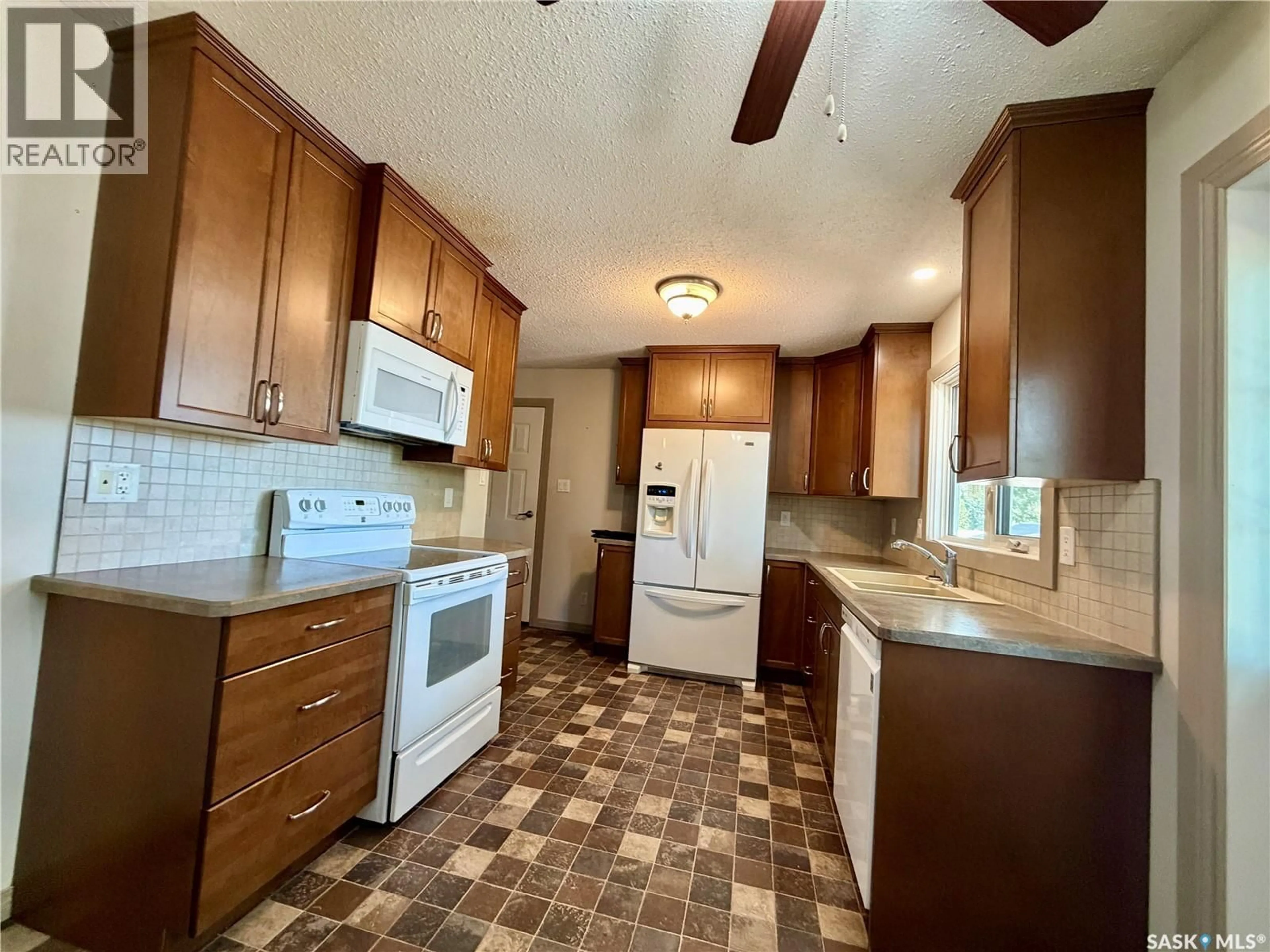 Standard kitchen, ceramic/tile floor for 97 BURKE CRESCENT, Swift Current Saskatchewan S9H4E4