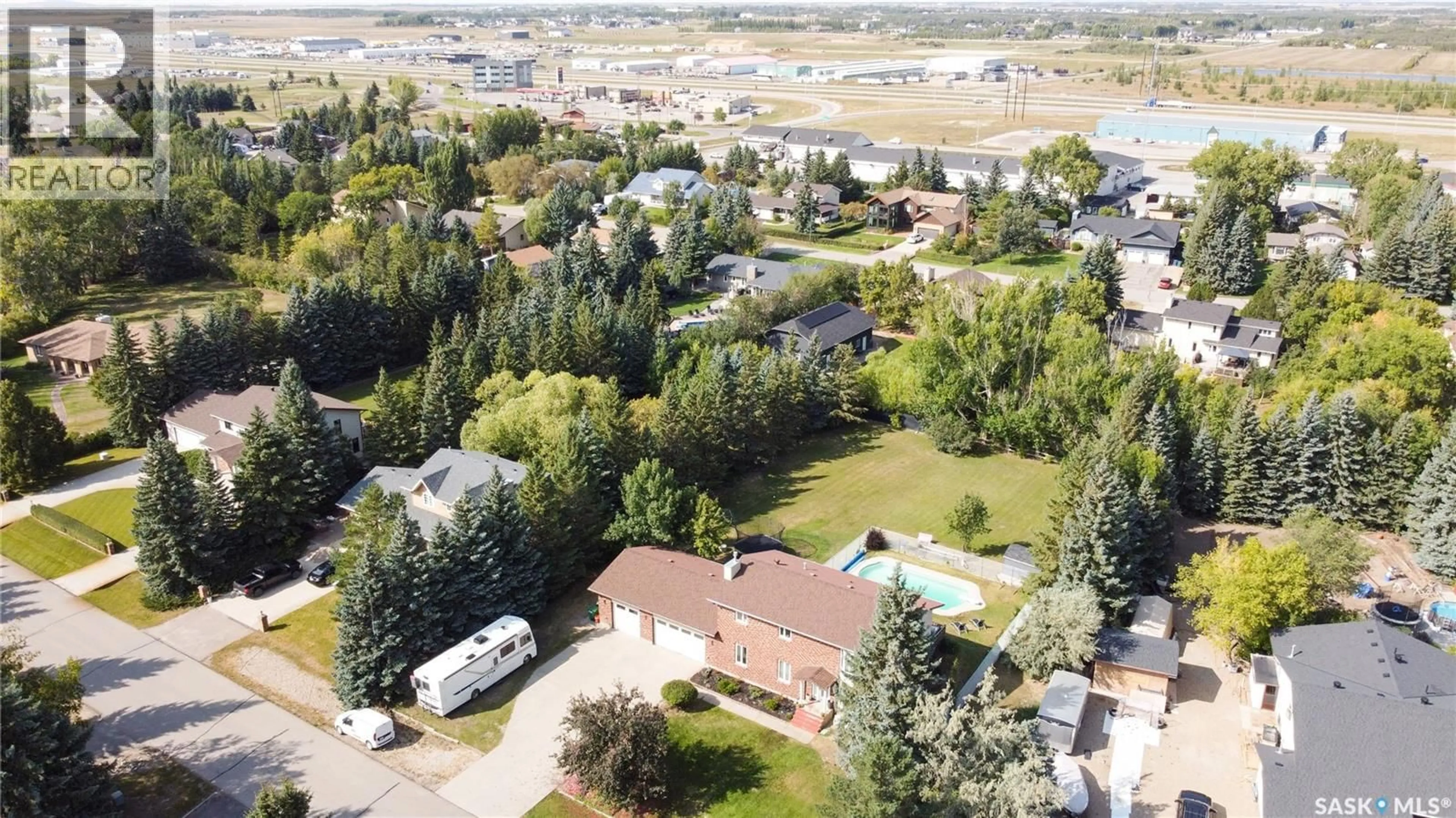 A pic from outside/outdoor area/front of a property/back of a property/a pic from drone, unknown for 18 PEARL CRESCENT, Edenwold Rm No.158 Saskatchewan S4L1A5