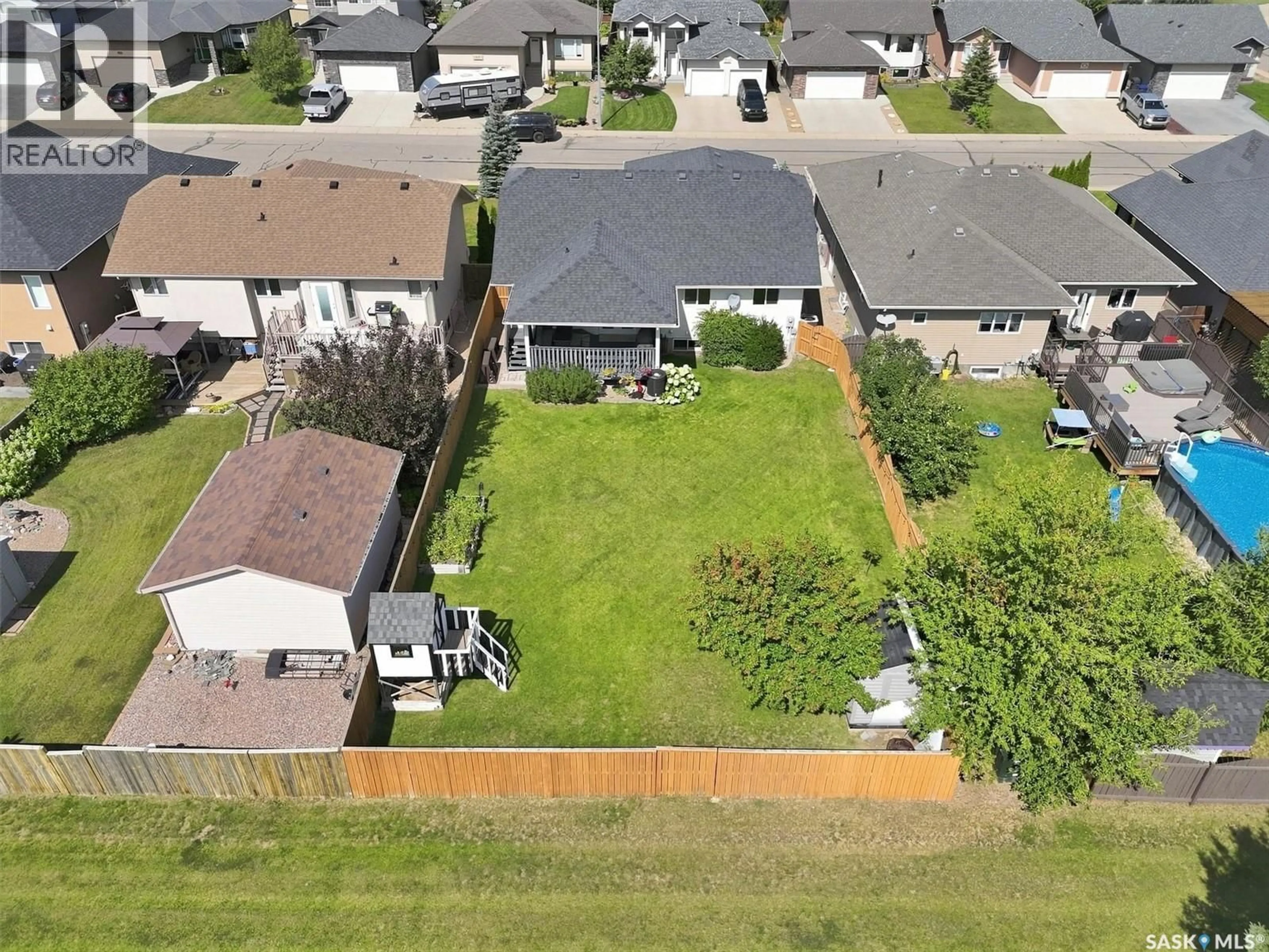 A pic from outside/outdoor area/front of a property/back of a property/a pic from drone, street for 211 CRENSHAW WAY, Warman Saskatchewan S0K4S1
