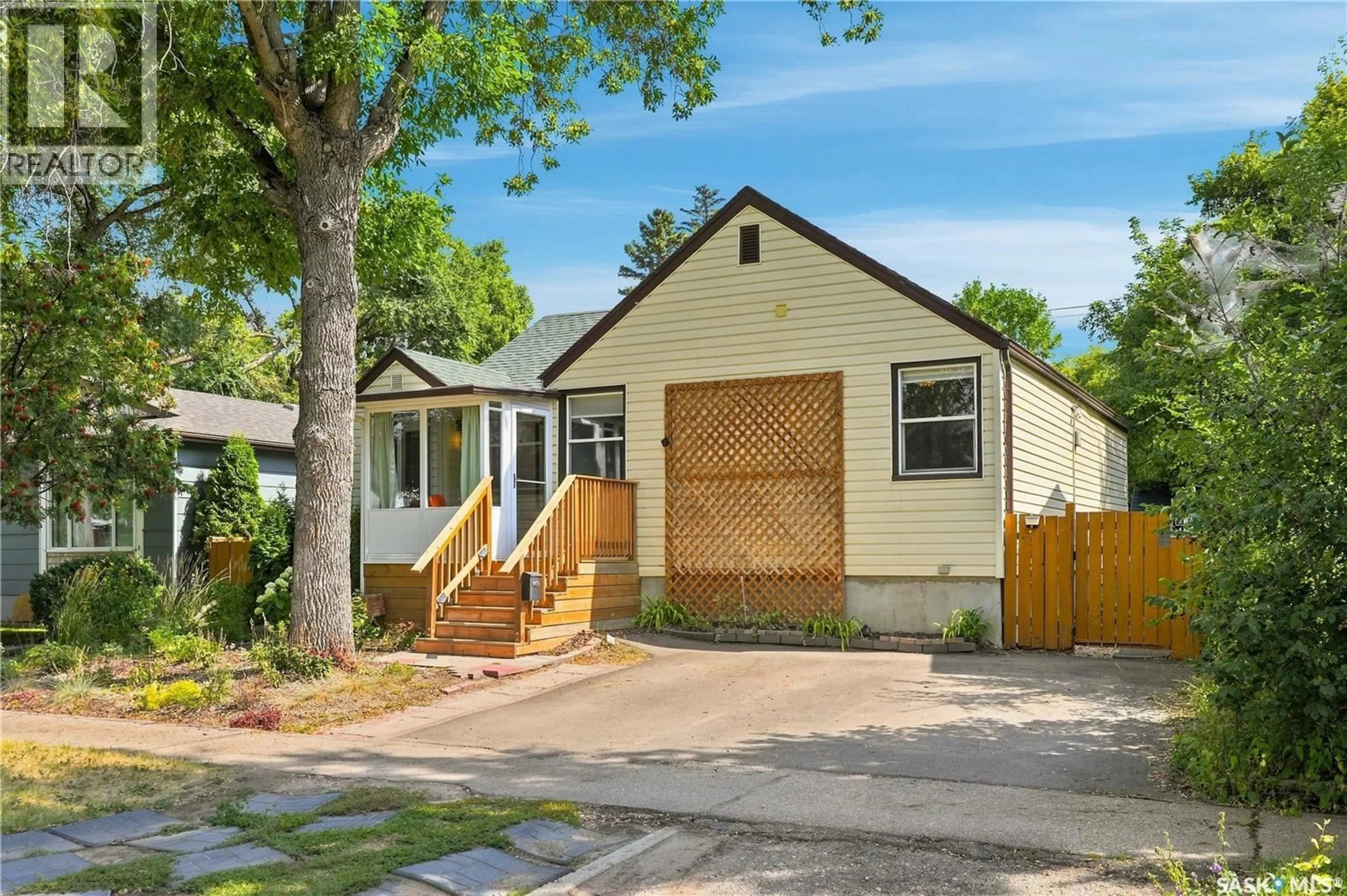 Home with vinyl exterior material, street for 2213 COY AVENUE, Saskatoon Saskatchewan S7M0J4