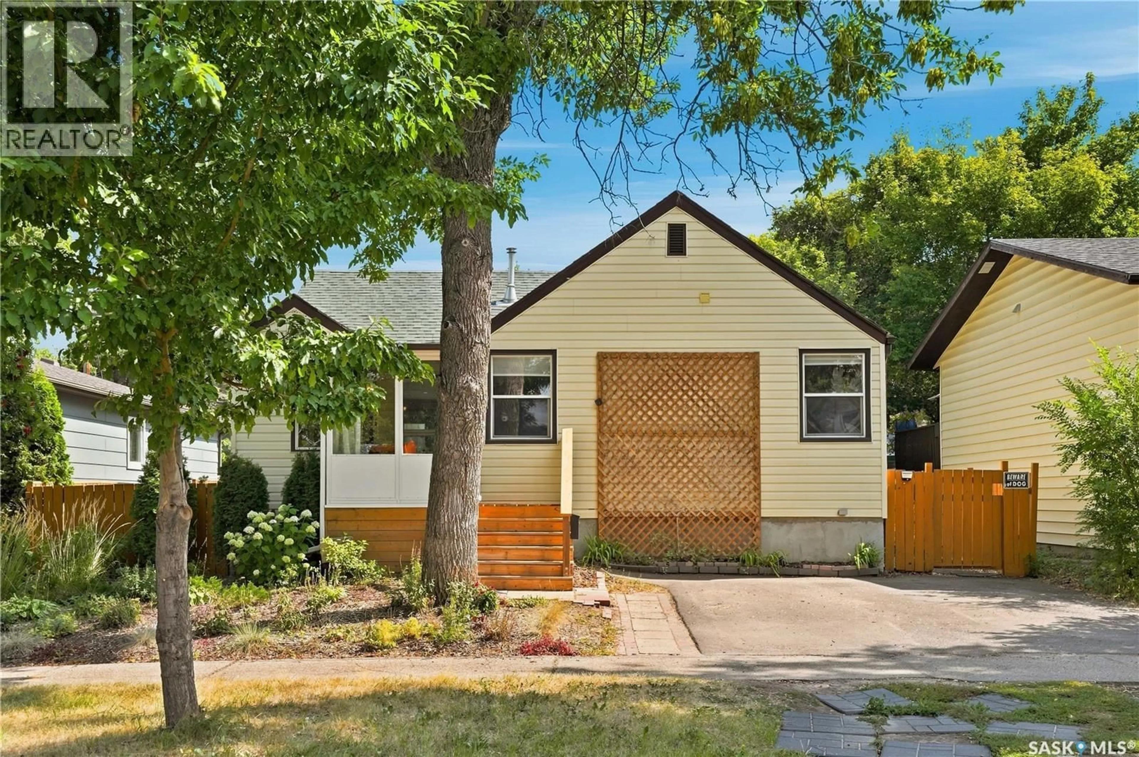 Home with vinyl exterior material, street for 2213 COY AVENUE, Saskatoon Saskatchewan S7M0J4