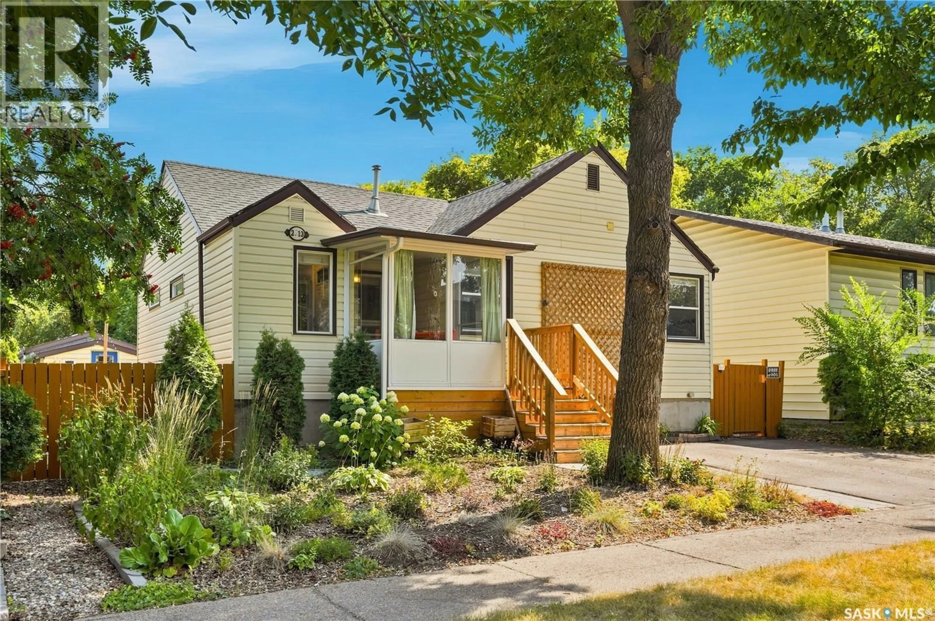 Home with vinyl exterior material, street for 2213 COY AVENUE, Saskatoon Saskatchewan S7M0J4