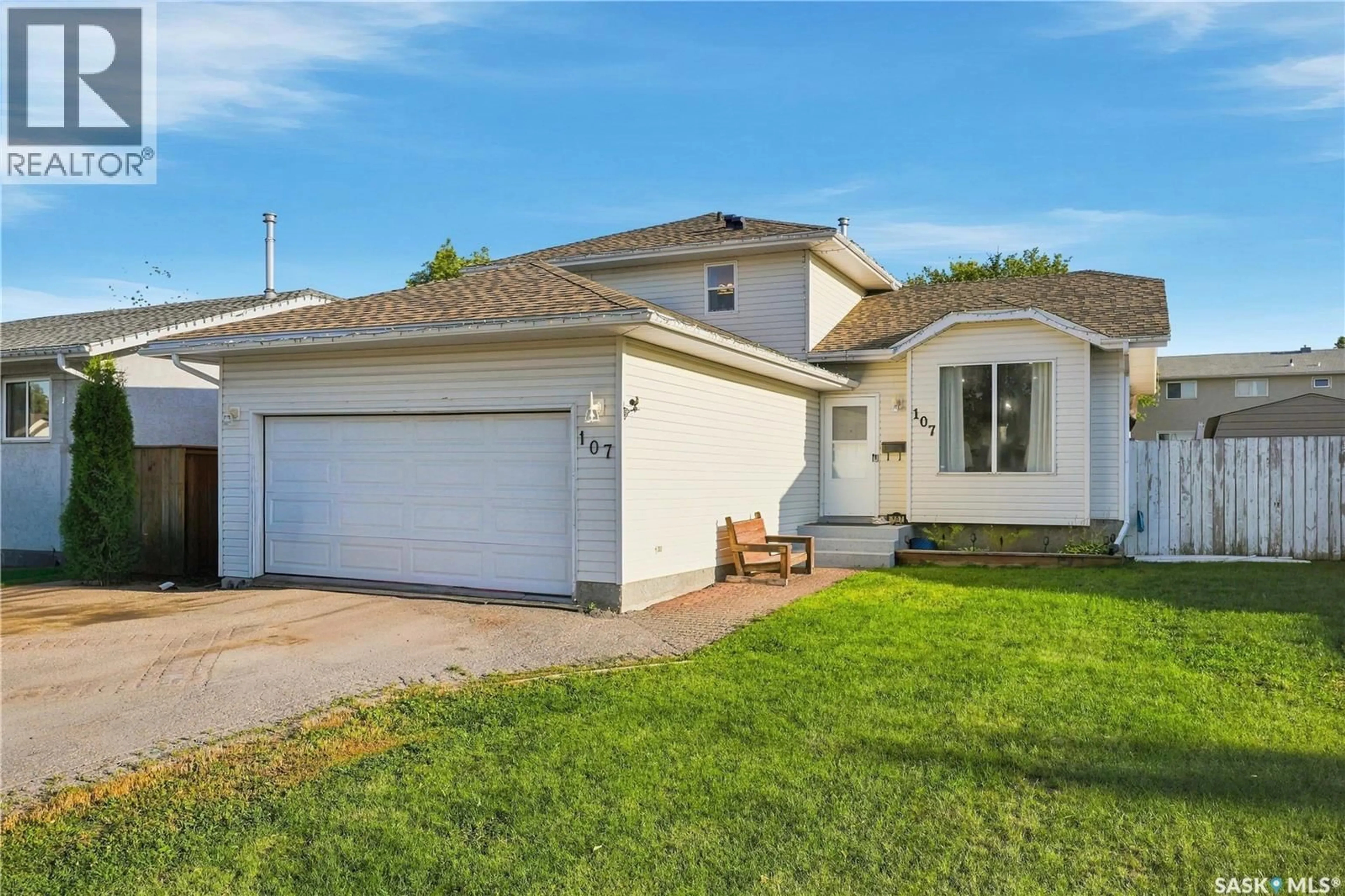 Home with vinyl exterior material, street for 107 HALL CRESCENT, Saskatoon Saskatchewan S7L7G7