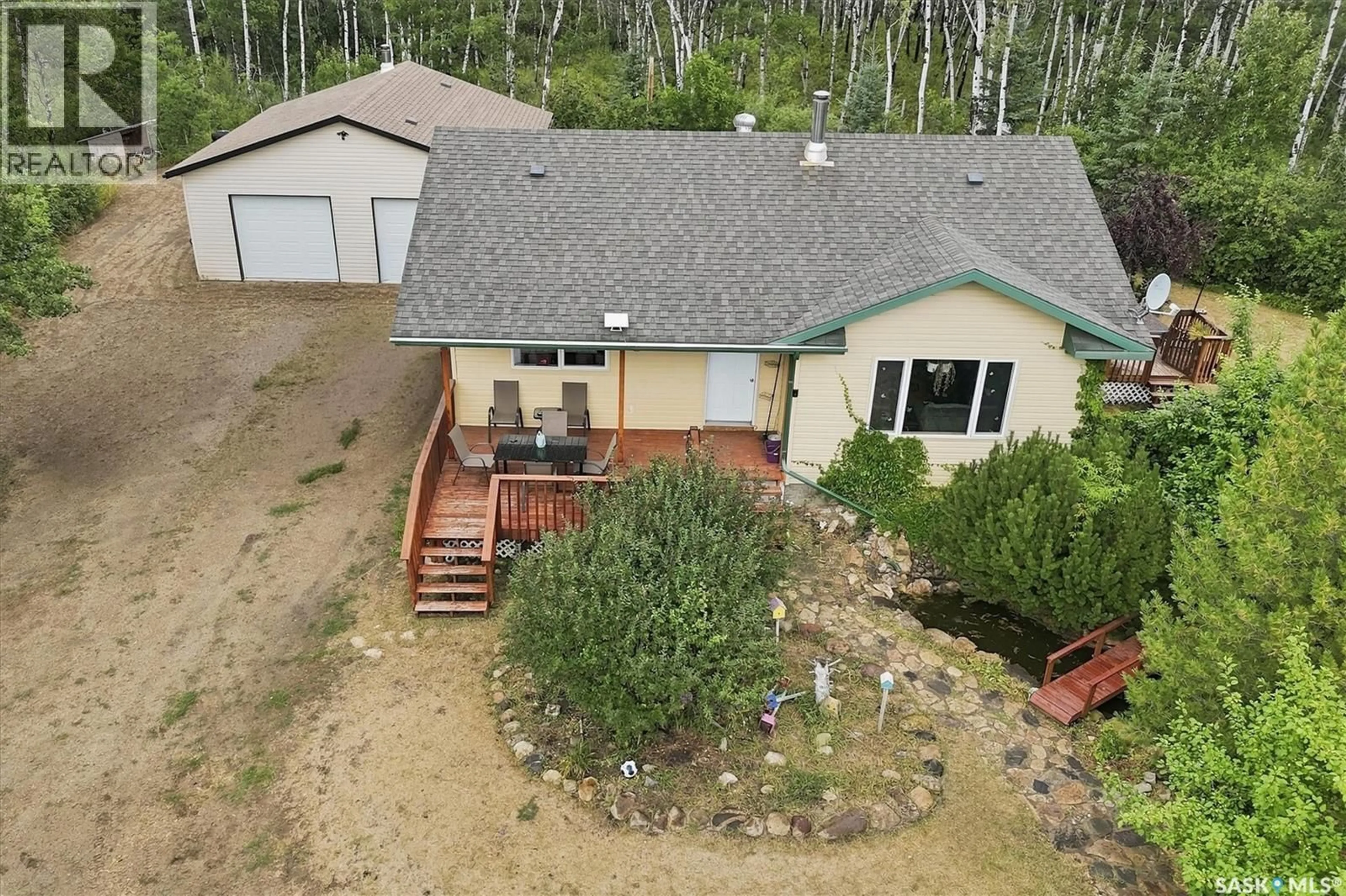 A pic from outside/outdoor area/front of a property/back of a property/a pic from drone, unknown for NYSTUEN LEE ACREAGE, Asquith Saskatchewan S0K1V0