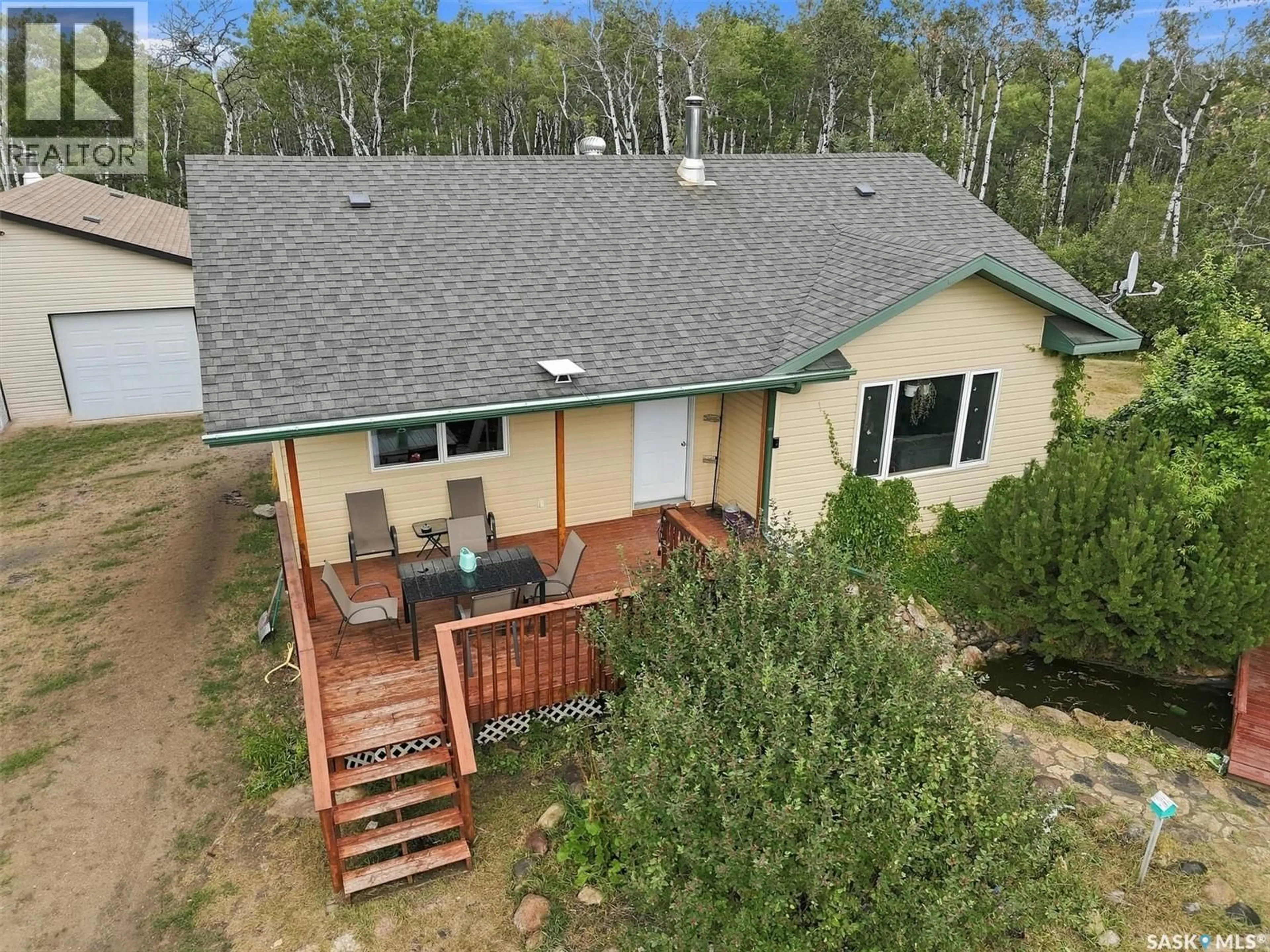 A pic from outside/outdoor area/front of a property/back of a property/a pic from drone, unknown for NYSTUEN LEE ACREAGE, Asquith Saskatchewan S0K1V0