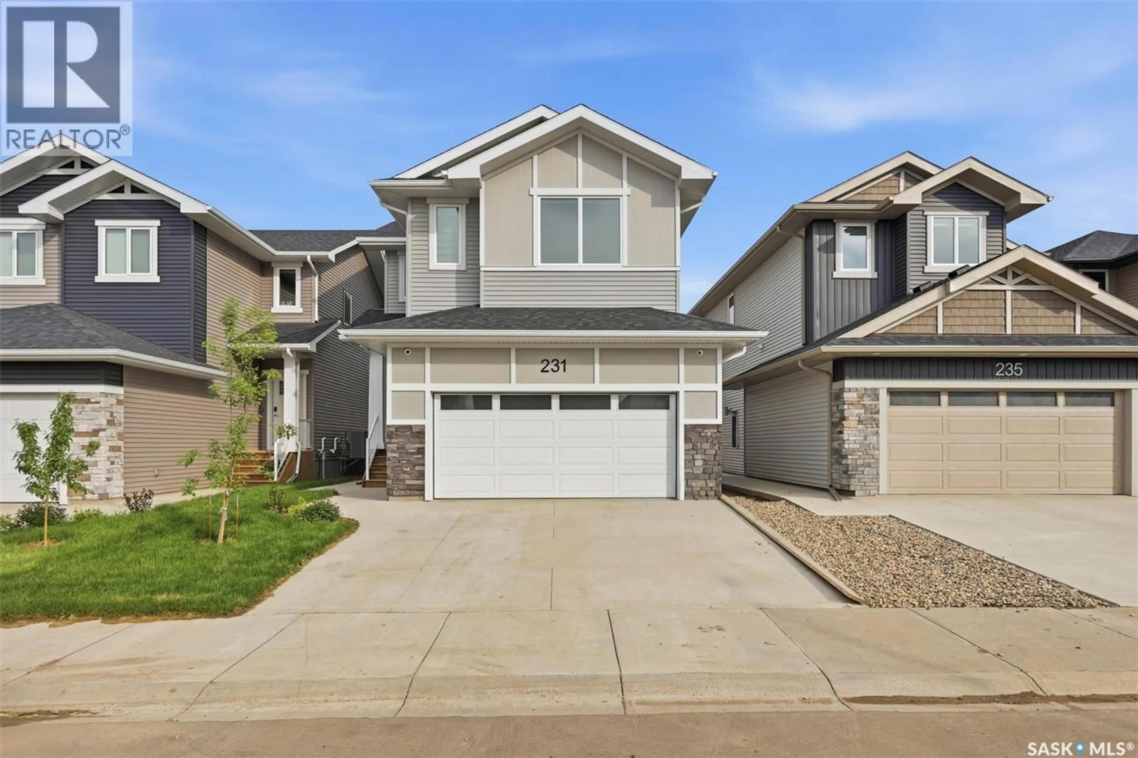 Home with vinyl exterior material, street for 231 KATZ COURT, Saskatoon Saskatchewan S7H4R1