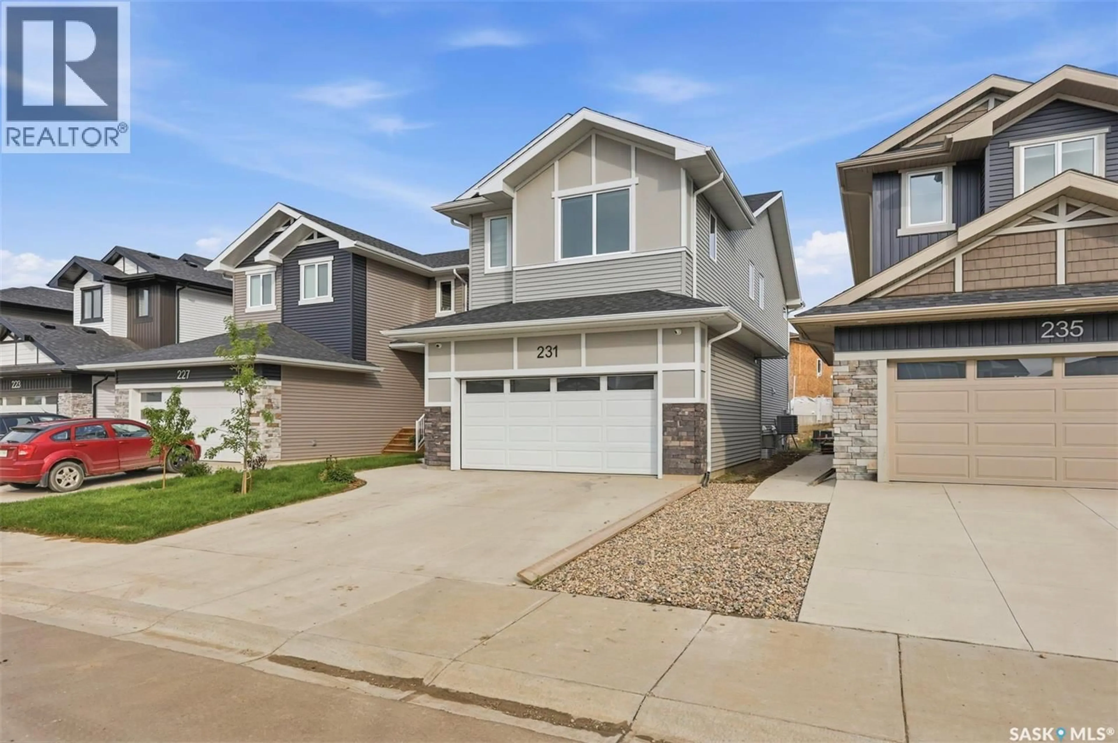 Home with vinyl exterior material, street for 231 KATZ COURT, Saskatoon Saskatchewan S7H4R1
