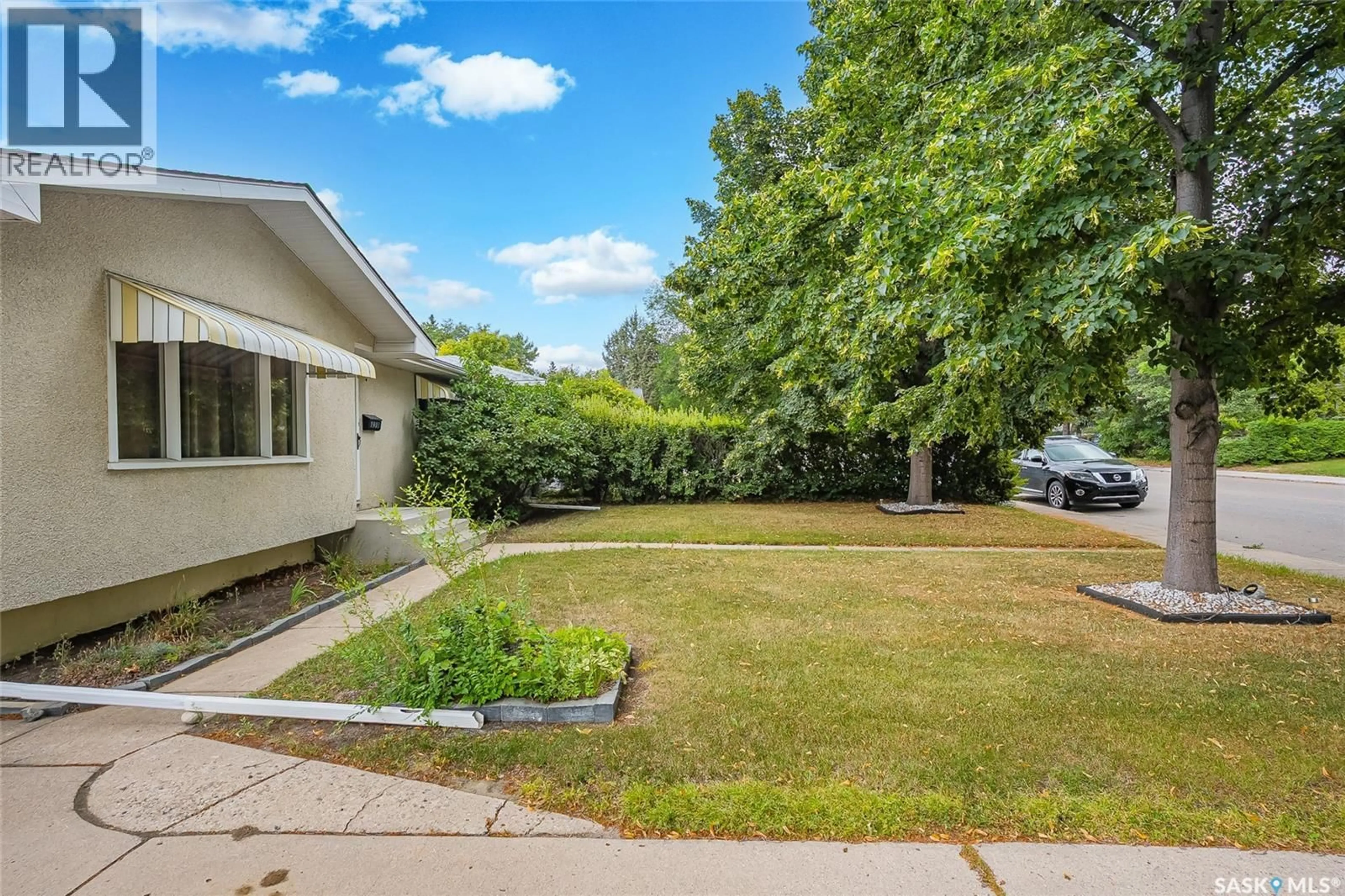 A pic from outside/outdoor area/front of a property/back of a property/a pic from drone, street for 1903 WILSON CRESCENT, Saskatoon Saskatchewan S7J2N8