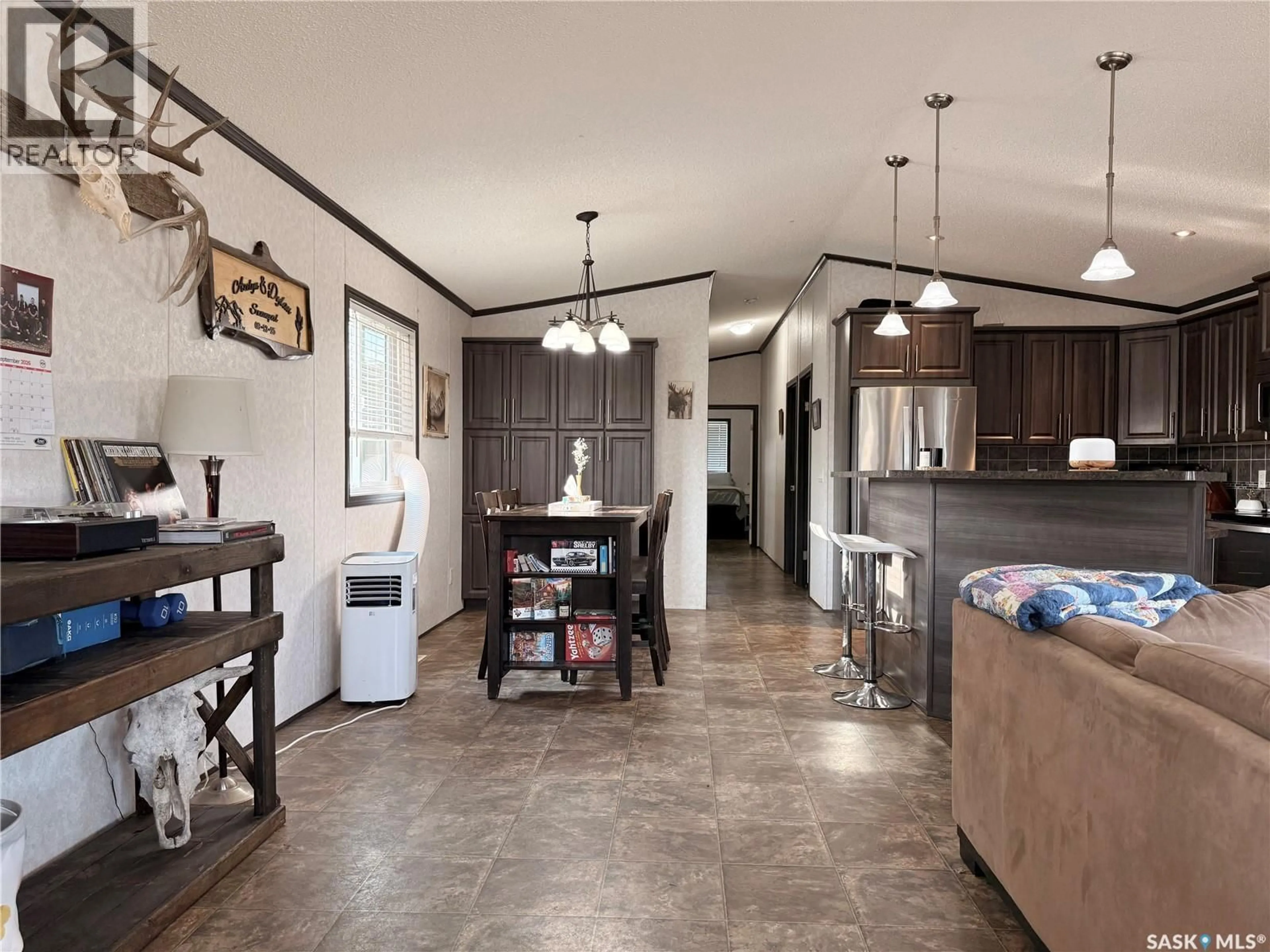 Open concept kitchen, ceramic/tile floor for 702 PRAIRIE AVENUE, Outlook Saskatchewan S0L2N0