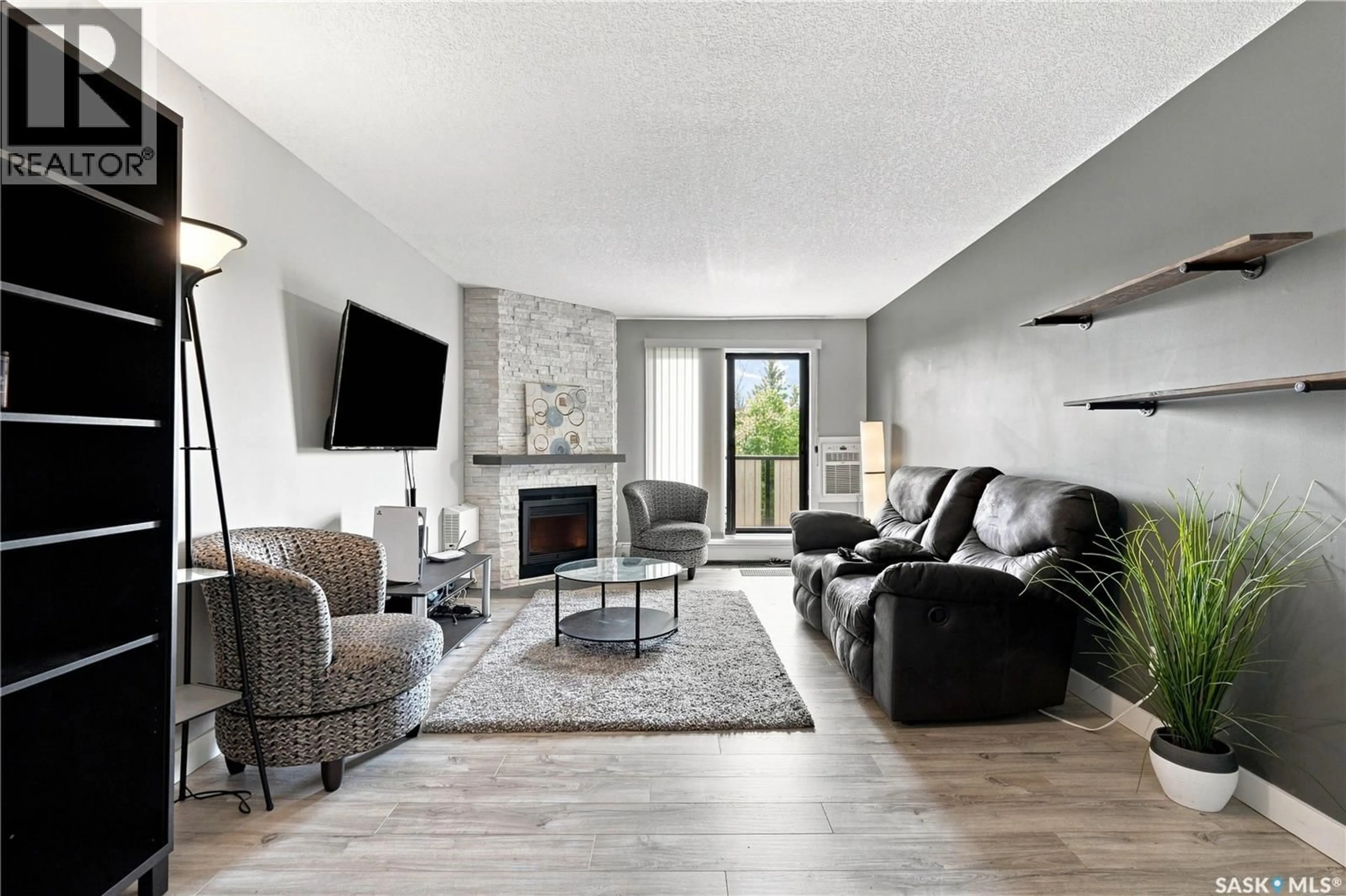 Living room with furniture, unknown for 308 - 423 TAIT COURT, Saskatoon Saskatchewan S7H5L3