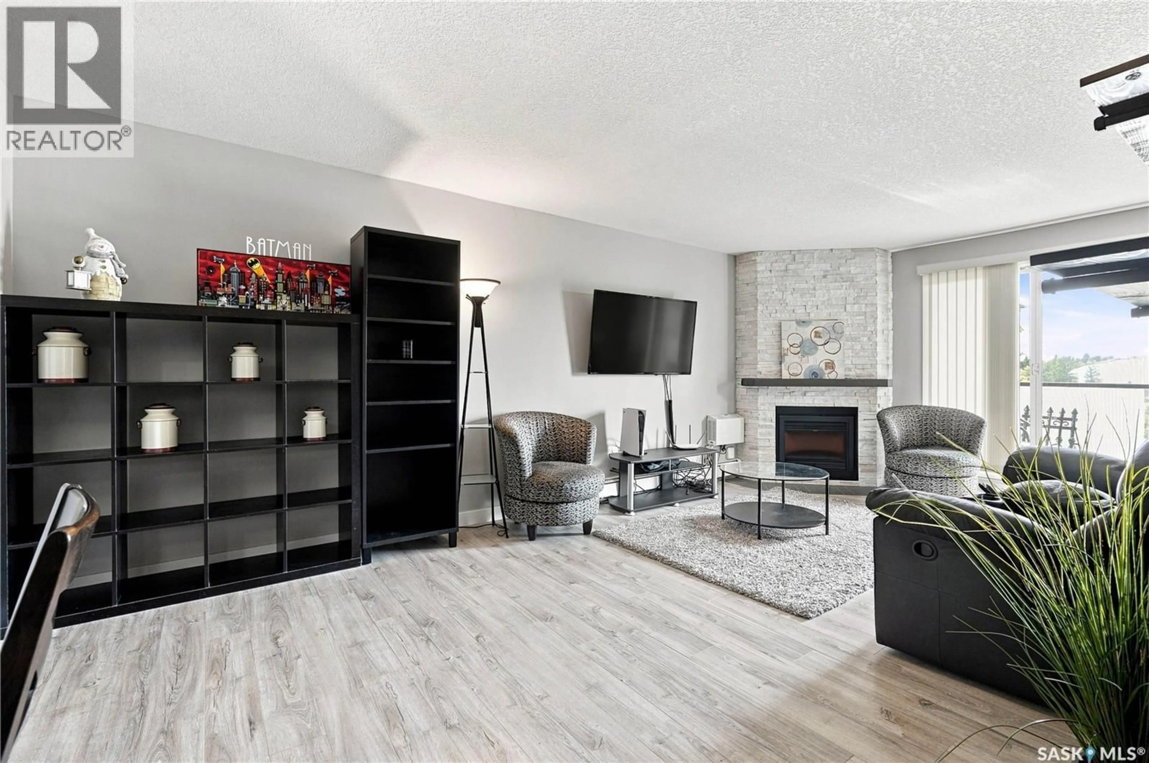 Living room with furniture, unknown for 308 - 423 TAIT COURT, Saskatoon Saskatchewan S7H5L3