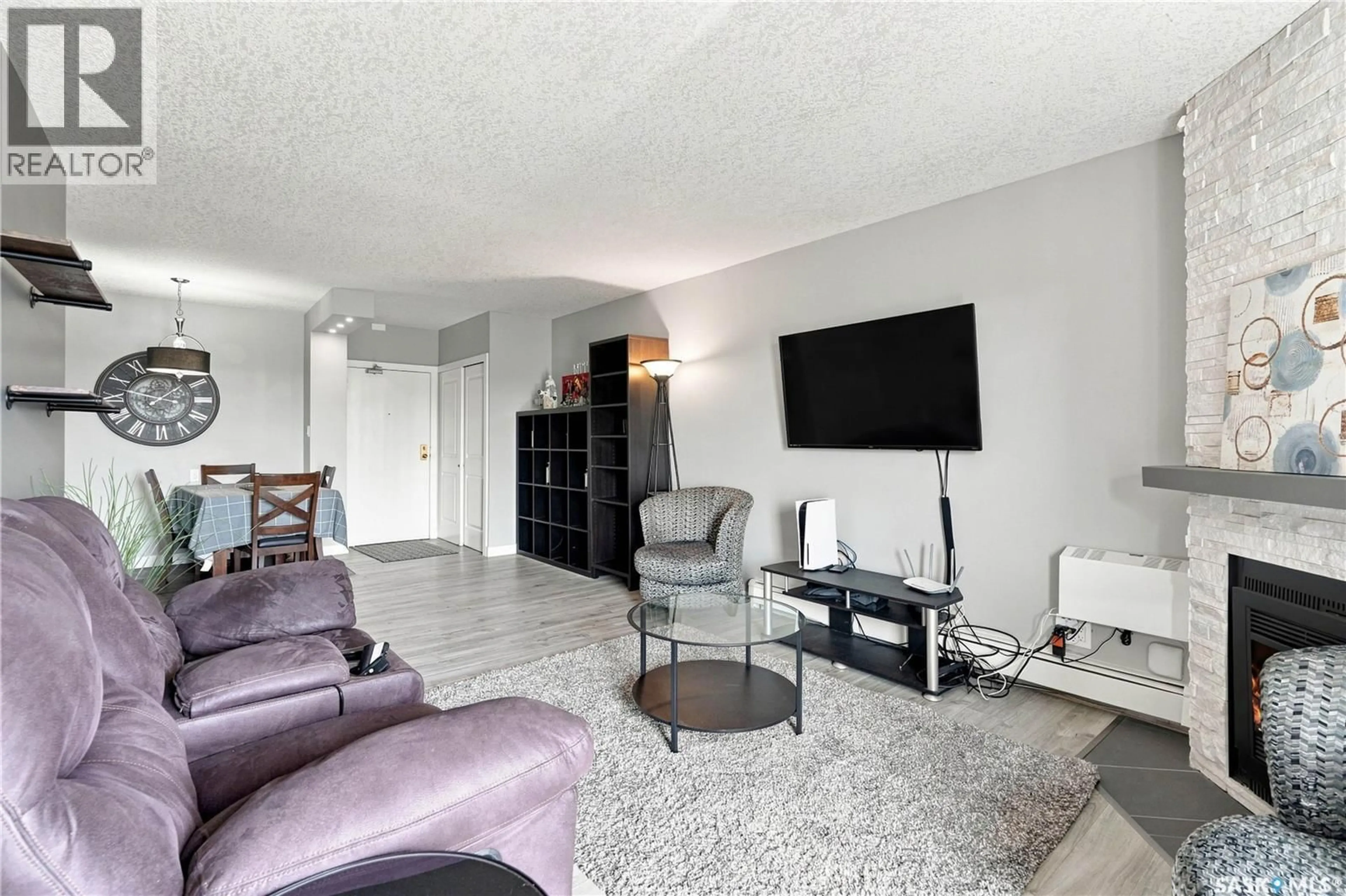 Living room with furniture, unknown for 308 - 423 TAIT COURT, Saskatoon Saskatchewan S7H5L3