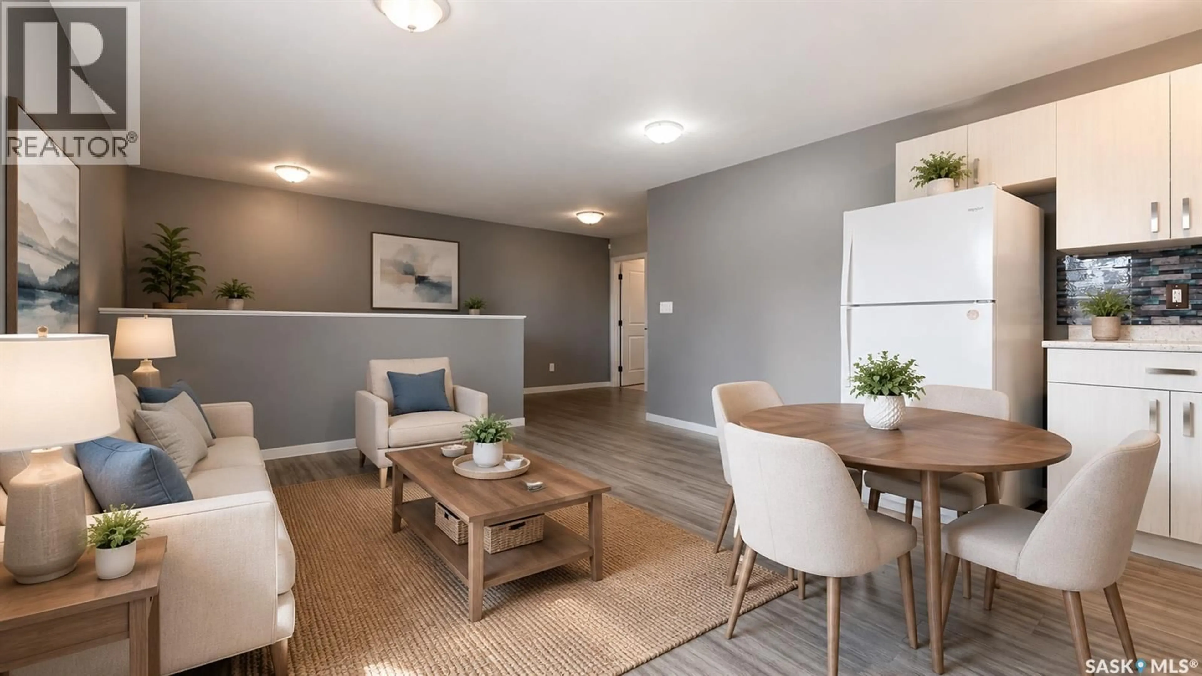 Living room with furniture, wood/laminate floor for 215 V AVENUE, Saskatoon Saskatchewan S7L3E5