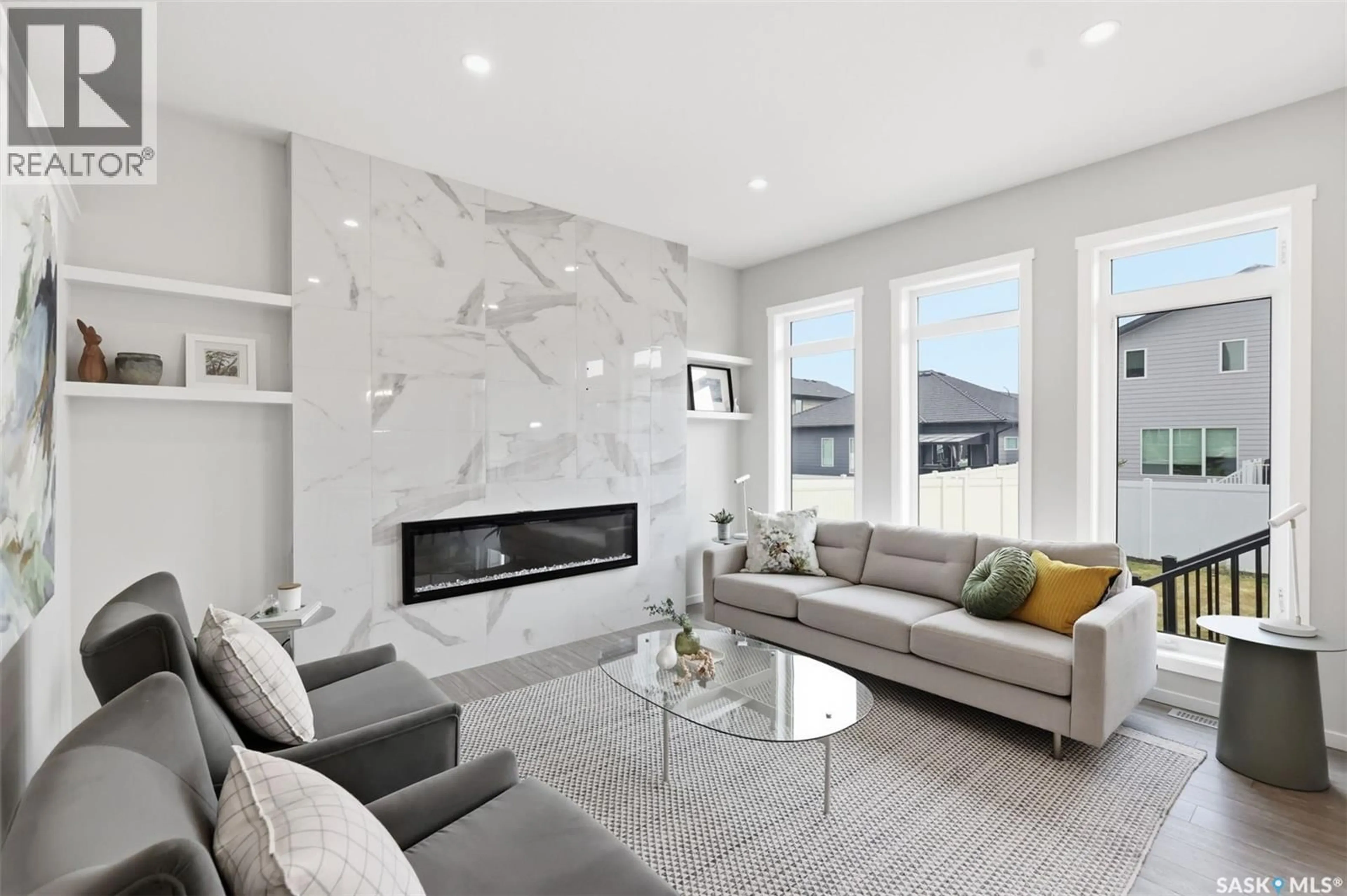 Living room with furniture, unknown for 446 ANISKOTAW WAY, Saskatoon Saskatchewan S7V1M3